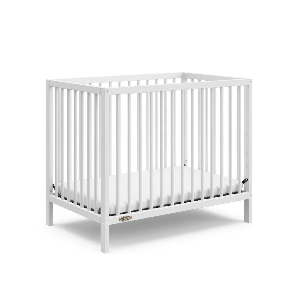 Teddi 4-in-1 Mini Convertible Crib with Mattress