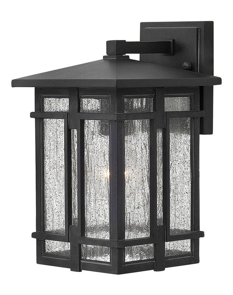 Tucker Museum Black Dimmable Outdoor Wall Sconce with Clear Seedy Glass