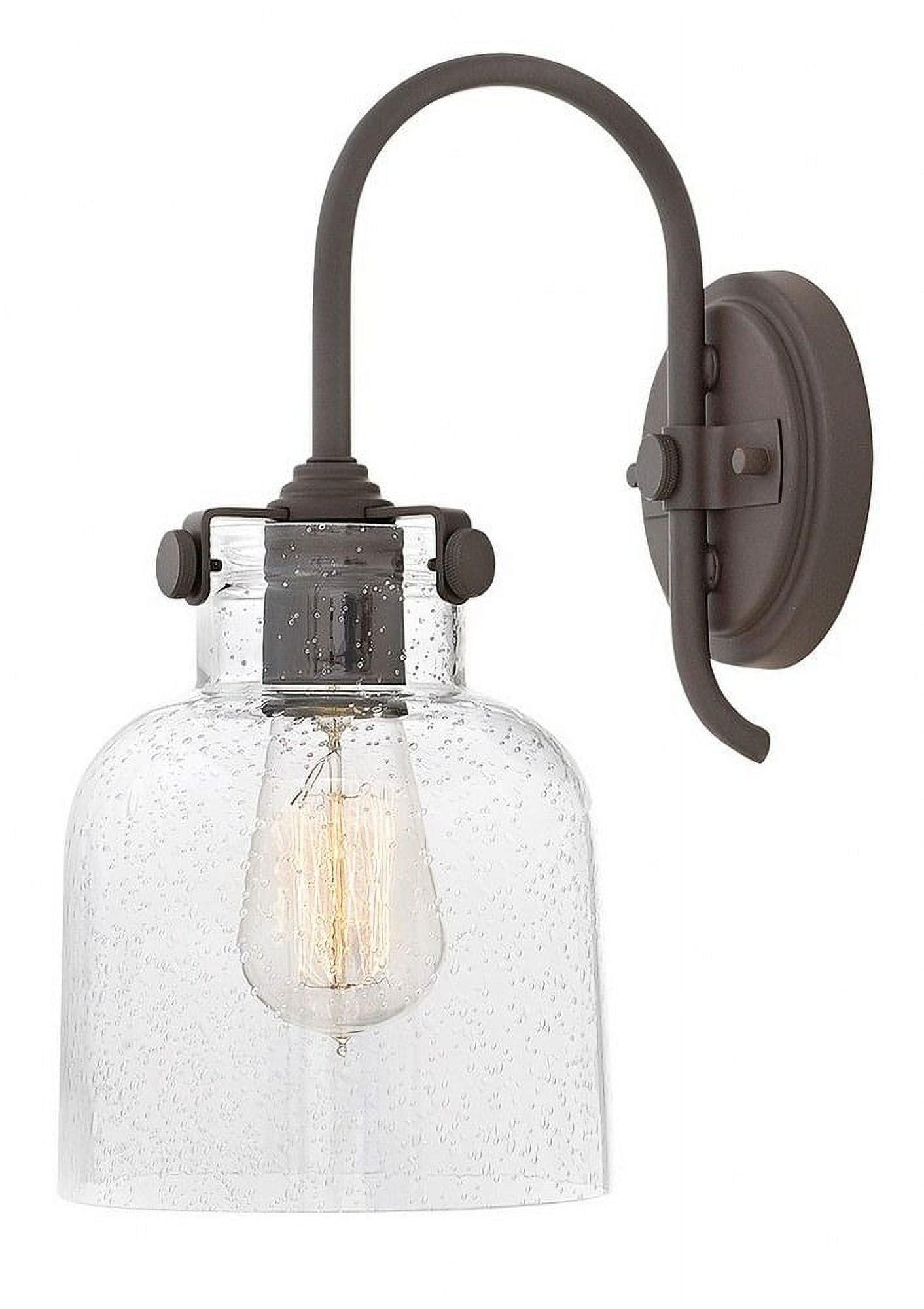 Elegant Dimmable Bronze Sconce with Clear Seedy Glass