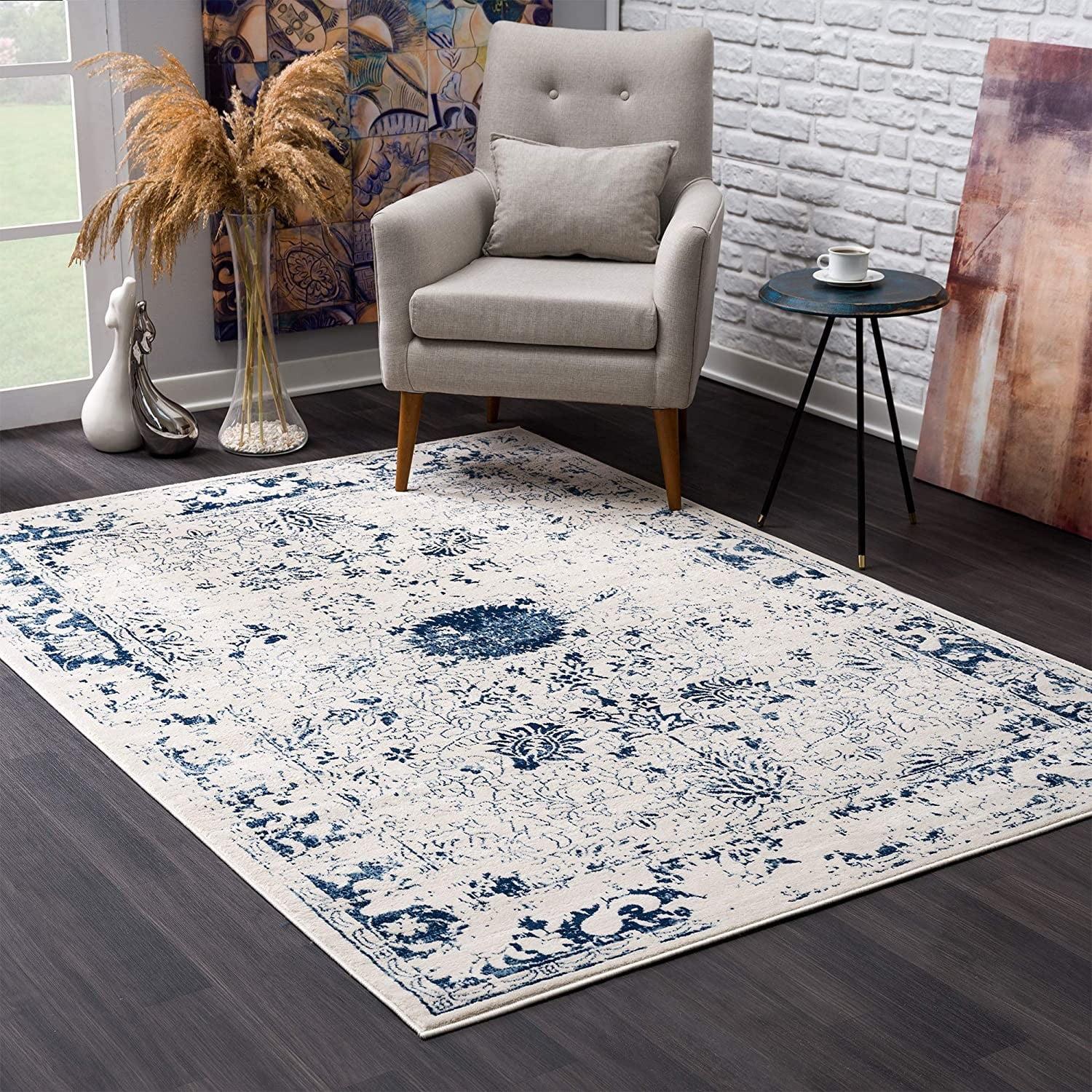 8' x 11' Navy Blue Distressed Floral Synthetic Area Rug