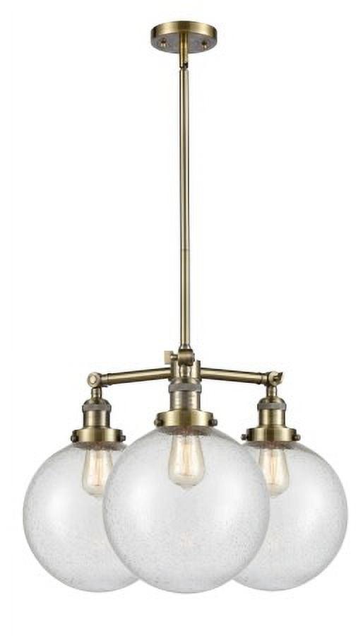 Antique Brass Beacon 3-Light Wide Chandelier with Seedy Glass Shades