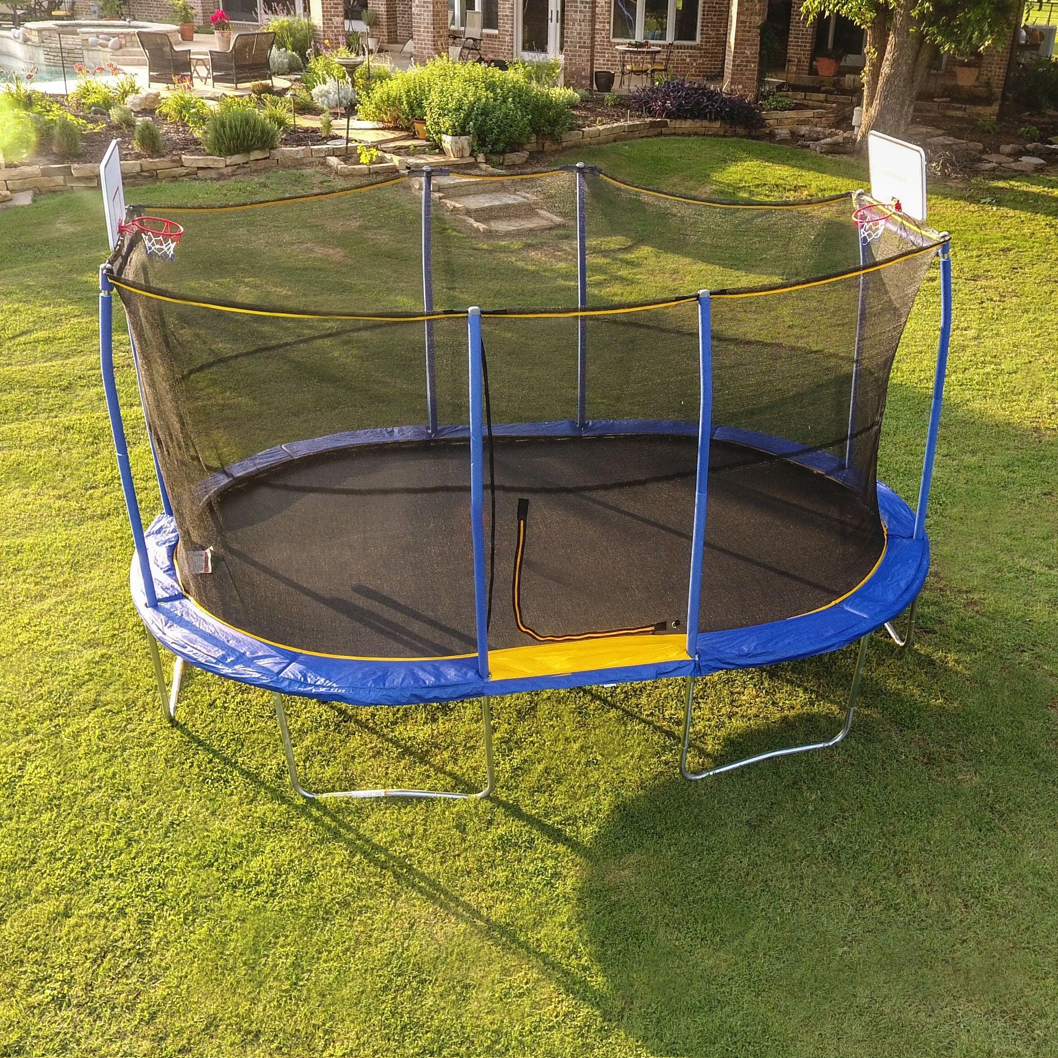 Jumpking 10’ X 15’ Oval Trampoline With Basketball Hoop