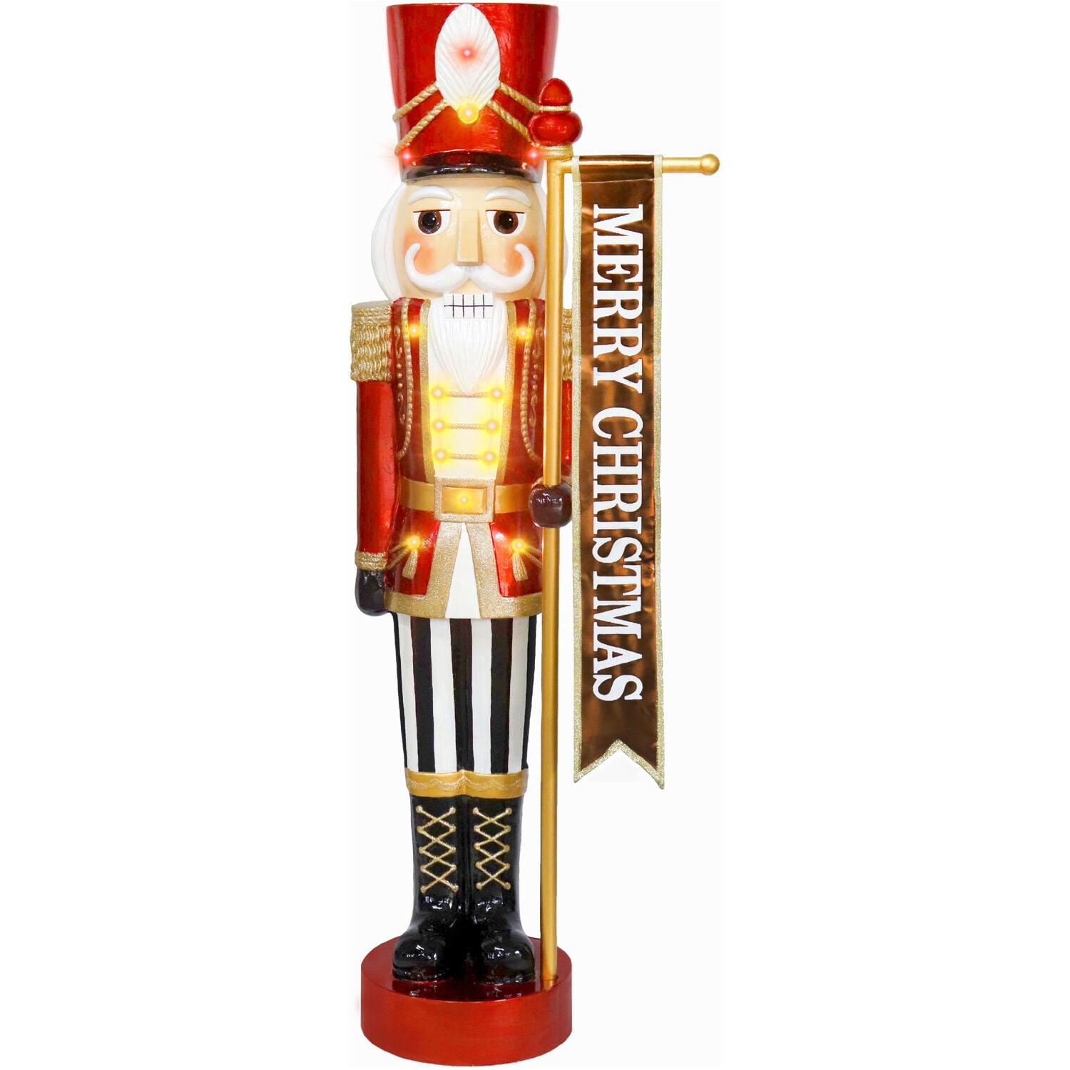 Fraser Hill Farm 4-Ft. Metallic Nutcracker Holding Banner Statue with LED Lights