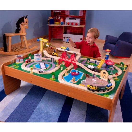 KidKraft Ride Around Town Wooden Train Set And Table With Storage Bins And 100 Pieces, Honey