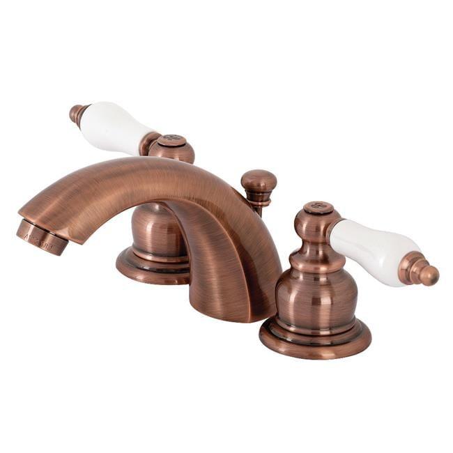 Kingston Brass Victorian Two-Handle 3-Hole Deck Mount Mini-Widespread Bathroom Faucet with Plastic Pop-Up