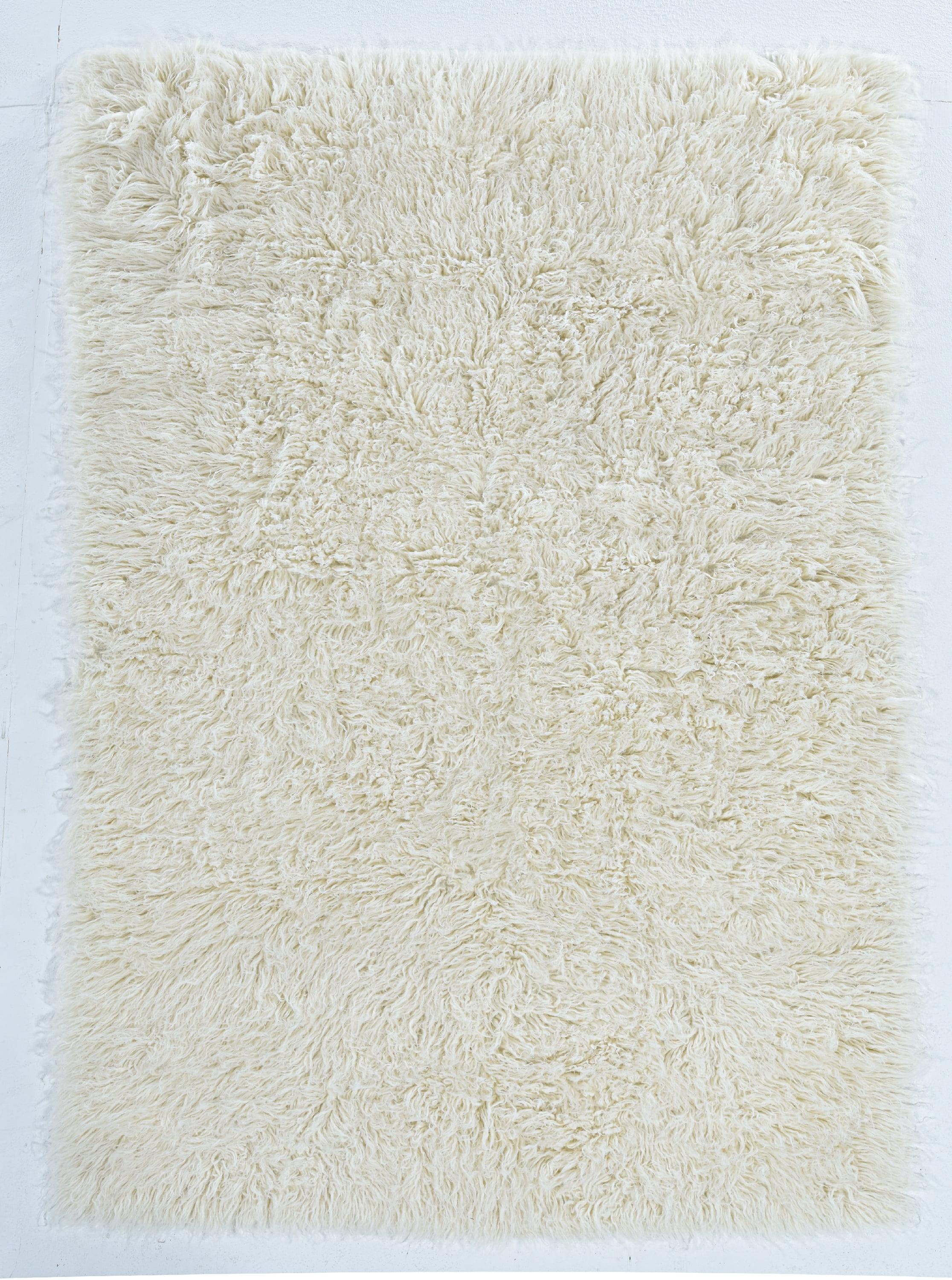 Ebern Designs Aaiden Flokati Wool Shag Hand Loomed Ivory Rug