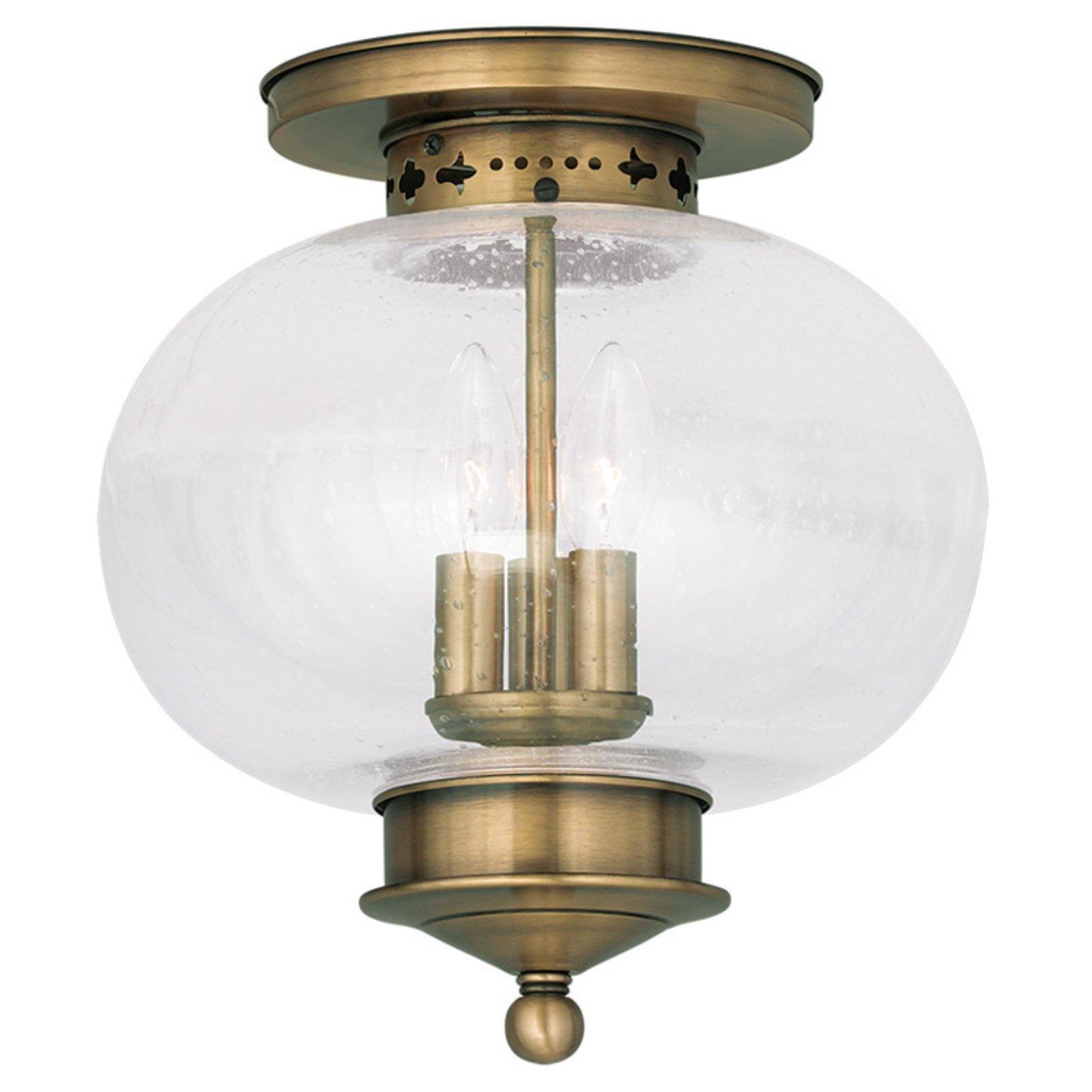 Harbor Antique Brass Globe LED Flush Mount with Hand Blown Seeded Glass