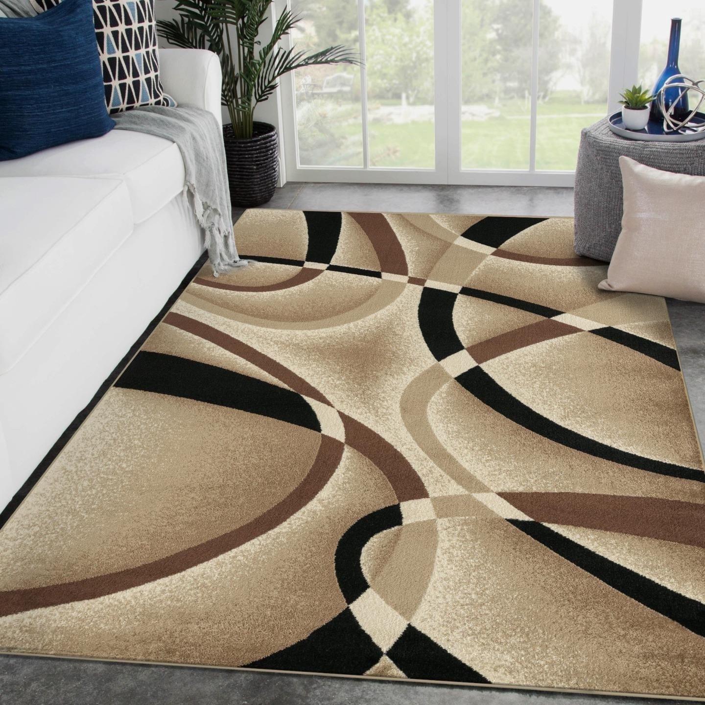 Fidel Abstract Machine Made Power Loom Polypropylene Indoor Area Rug in Beige