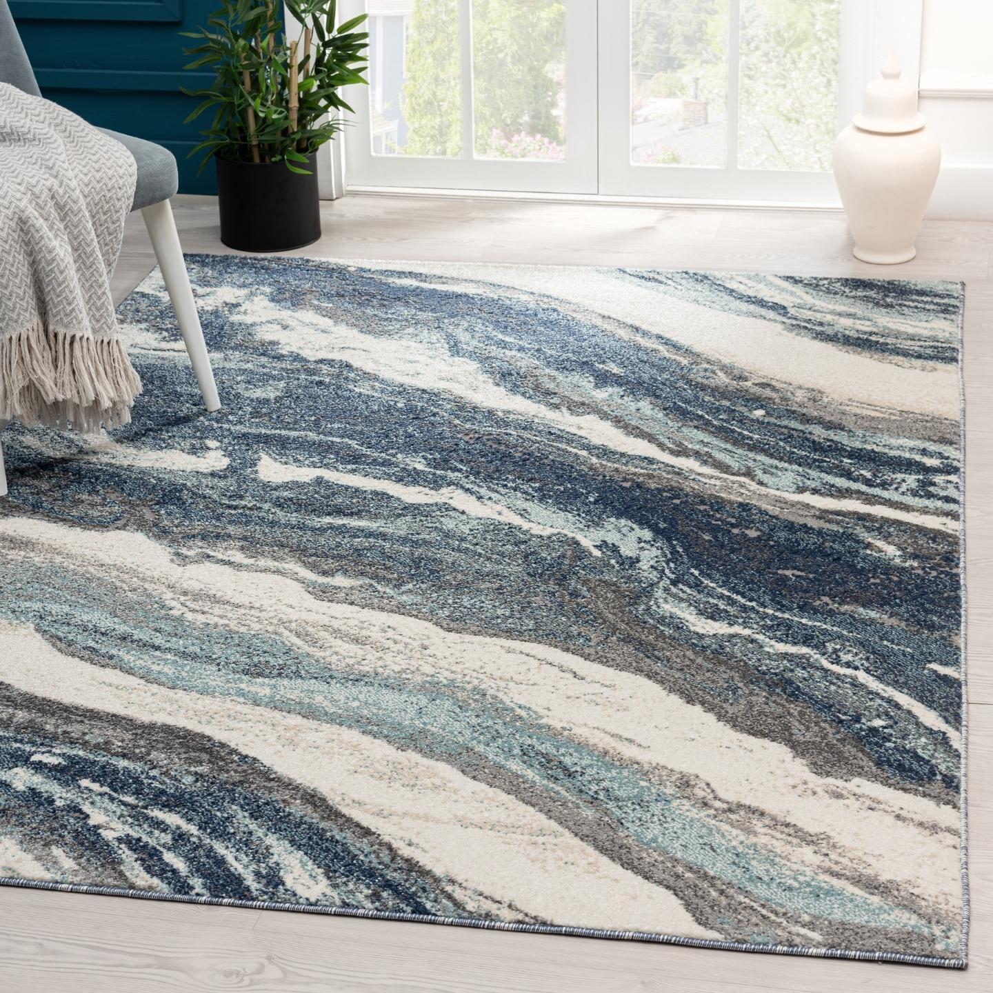 Blue and White Abstract 8' x 10' Synthetic Area Rug