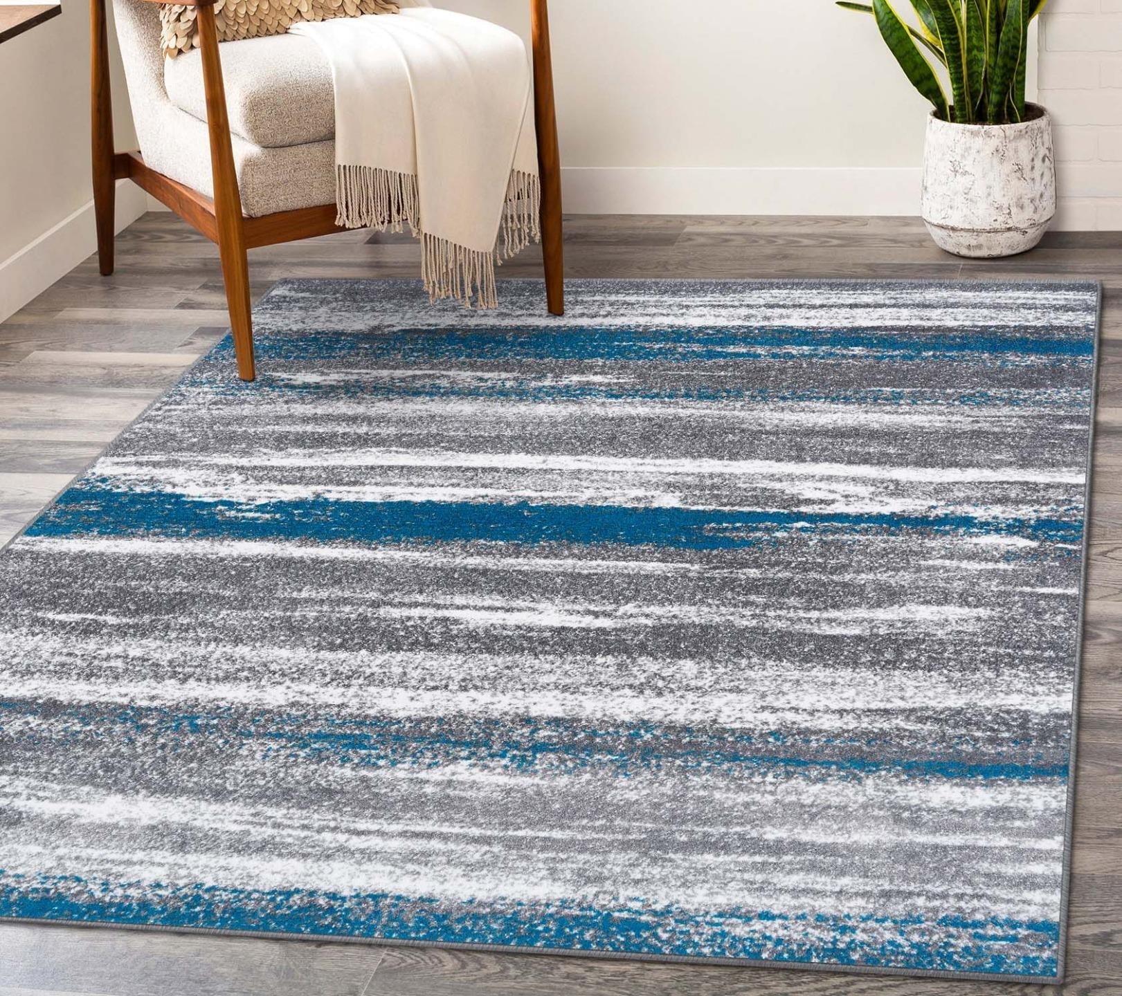 Turquoise and Gray Abstract 6' x 9' Synthetic Area Rug