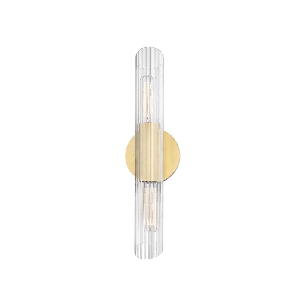 Elegant Aged Brass Cylinder Wall Sconce with Clear Glass Shade