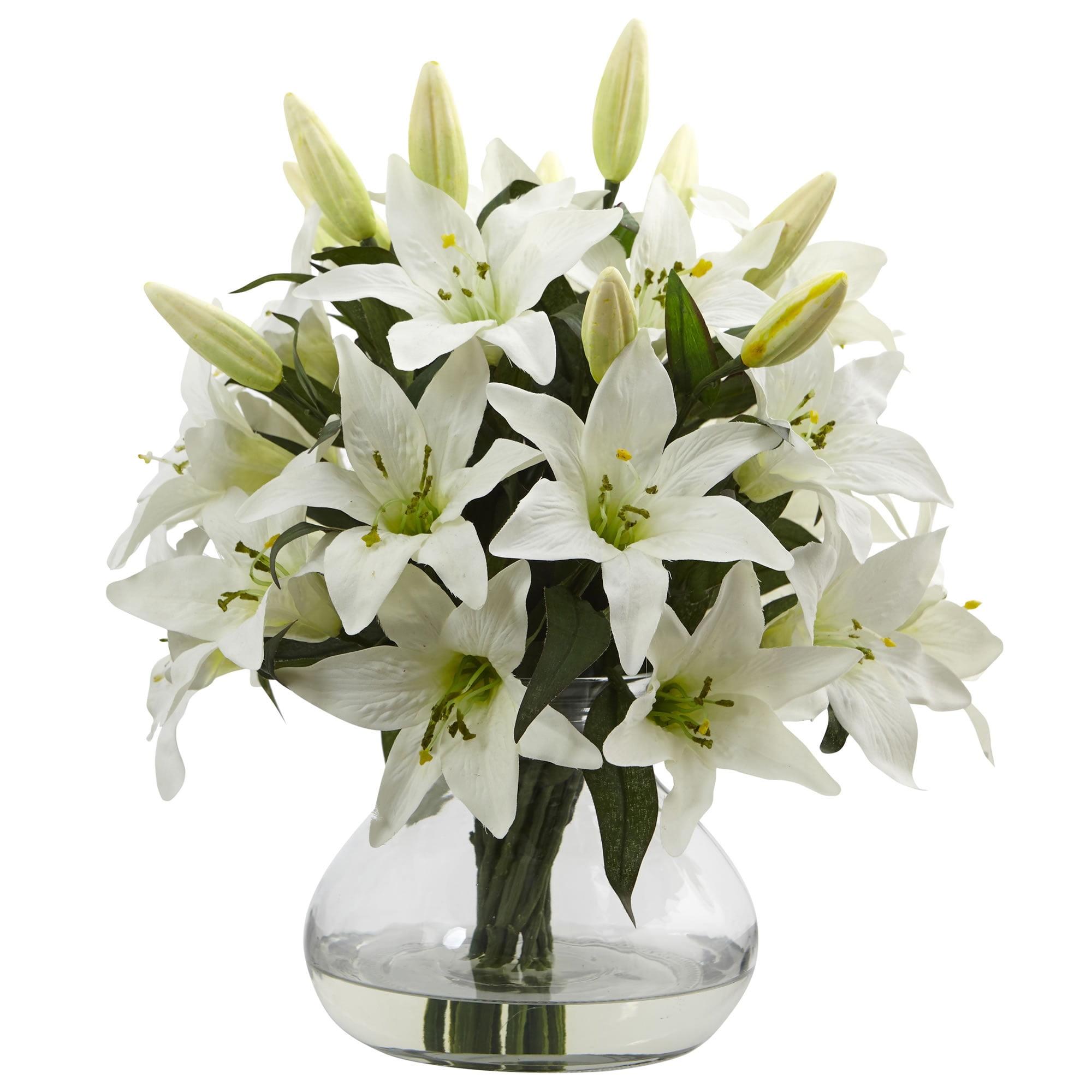 Luscious White Lily Tabletop Arrangement in Curved Glass Vase
