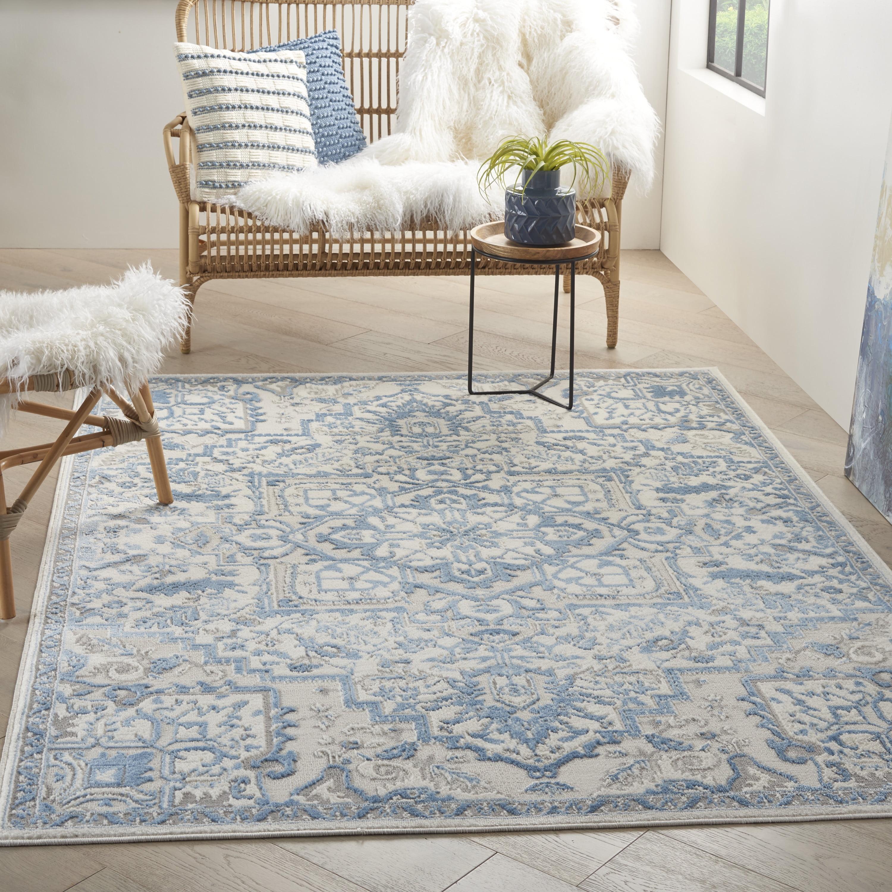 Ivory Blue Floral Synthetic 5' x 7' Rectangular Rug