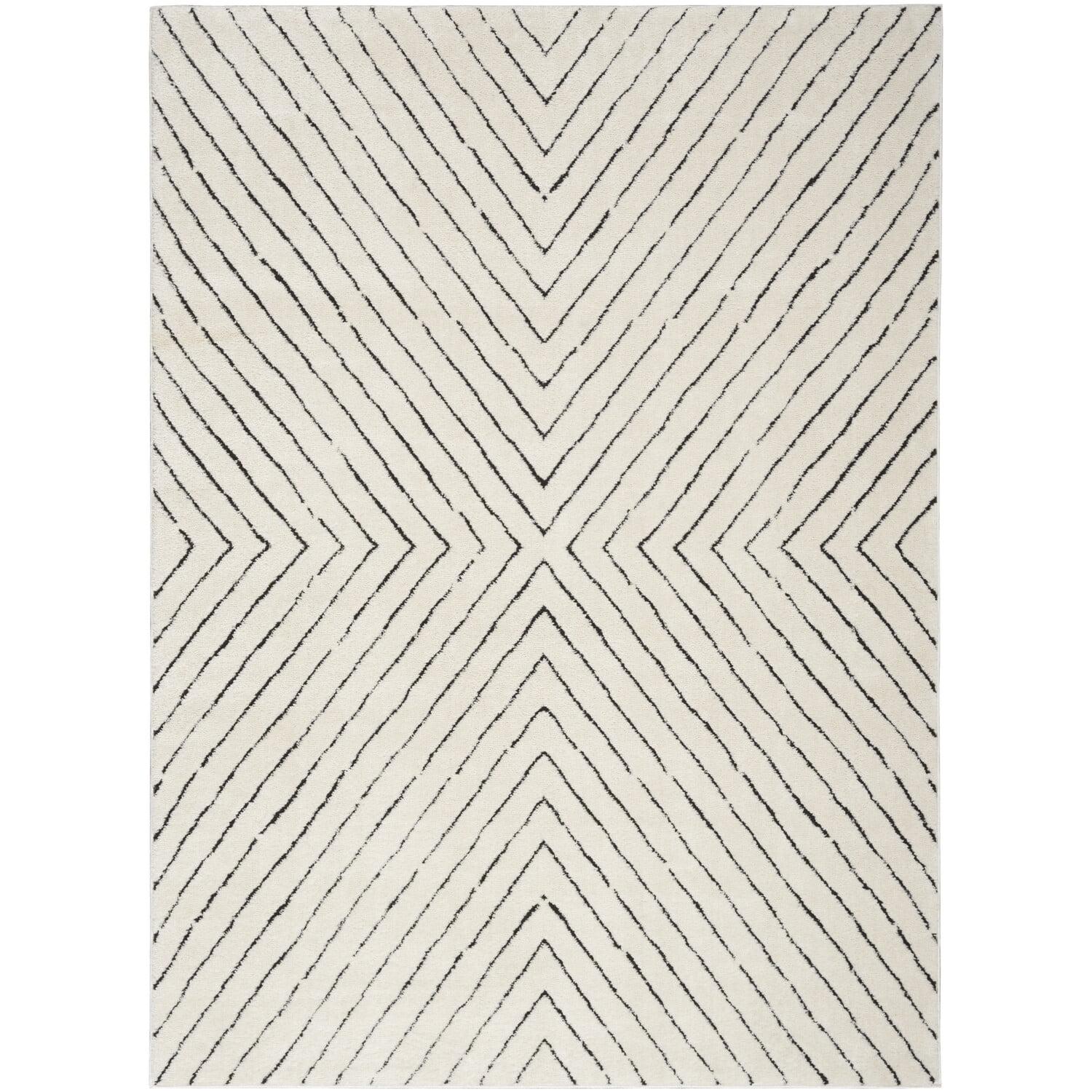 Ivory and Black Chevron Striped 5' x 7' Synthetic Area Rug