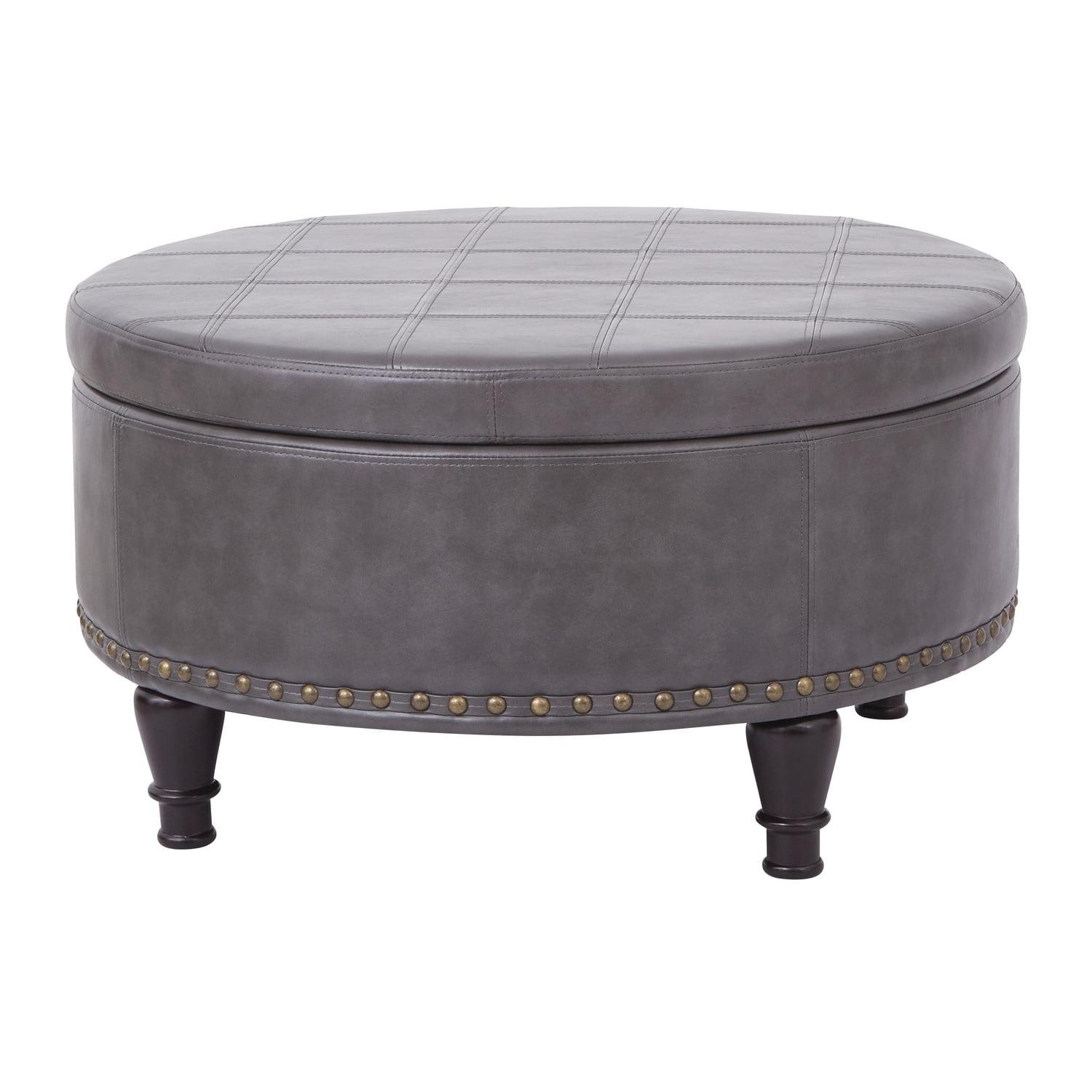 OSP Home Furnishings Augusta Round Storage Ottoman in Pewter Bonded Leather with decorative nailheads