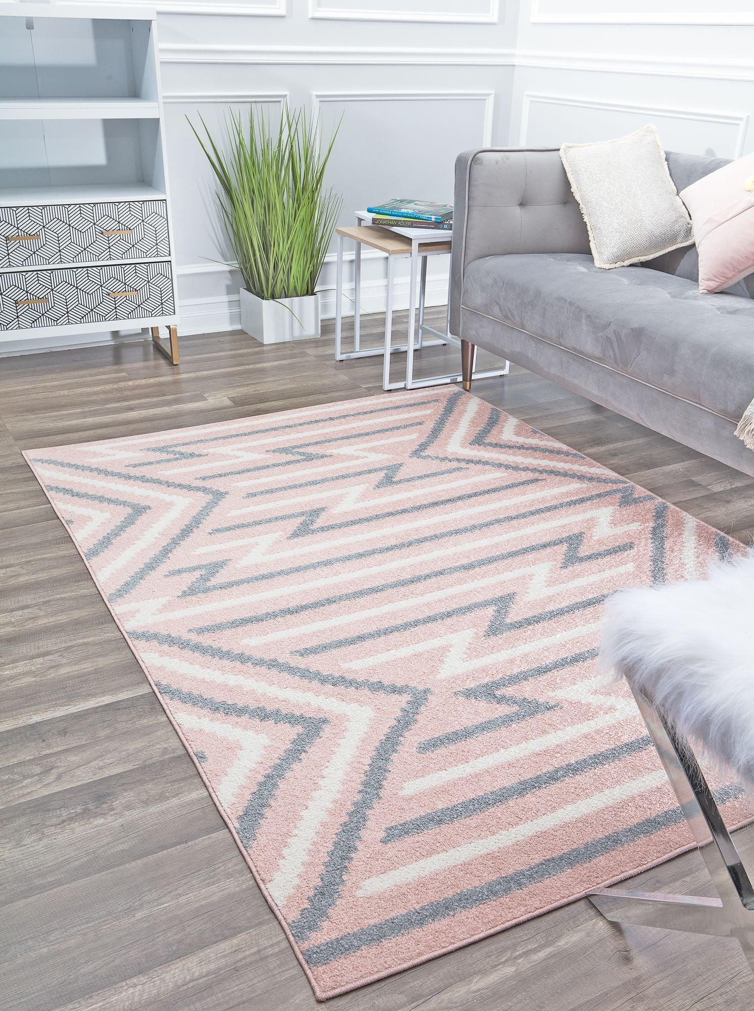 6' x 9' Gray and Pink Geometric Synthetic Area Rug