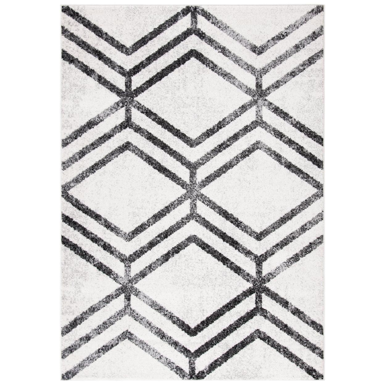 Ivory and Charcoal Geometric Synthetic Area Rug