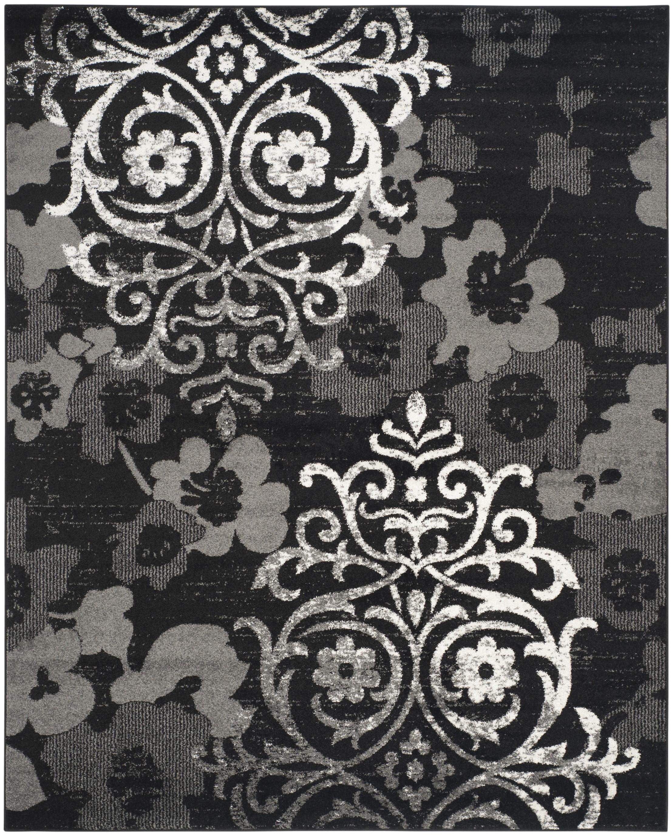 Elegant Black/Silver 9' x 12' Reversible Synthetic Area Rug