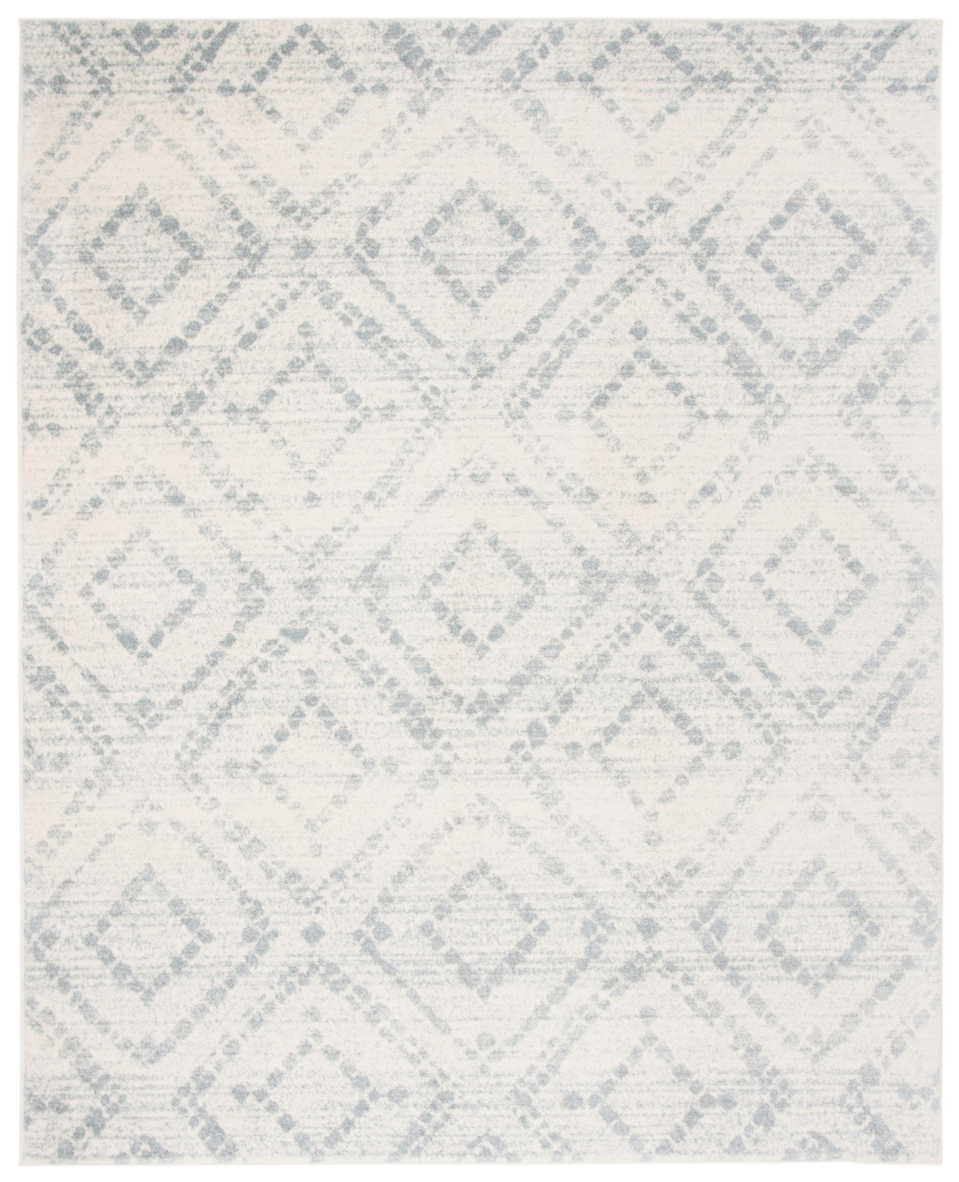 Ivory and Light Blue Geometric 9' x 12' Synthetic Area Rug