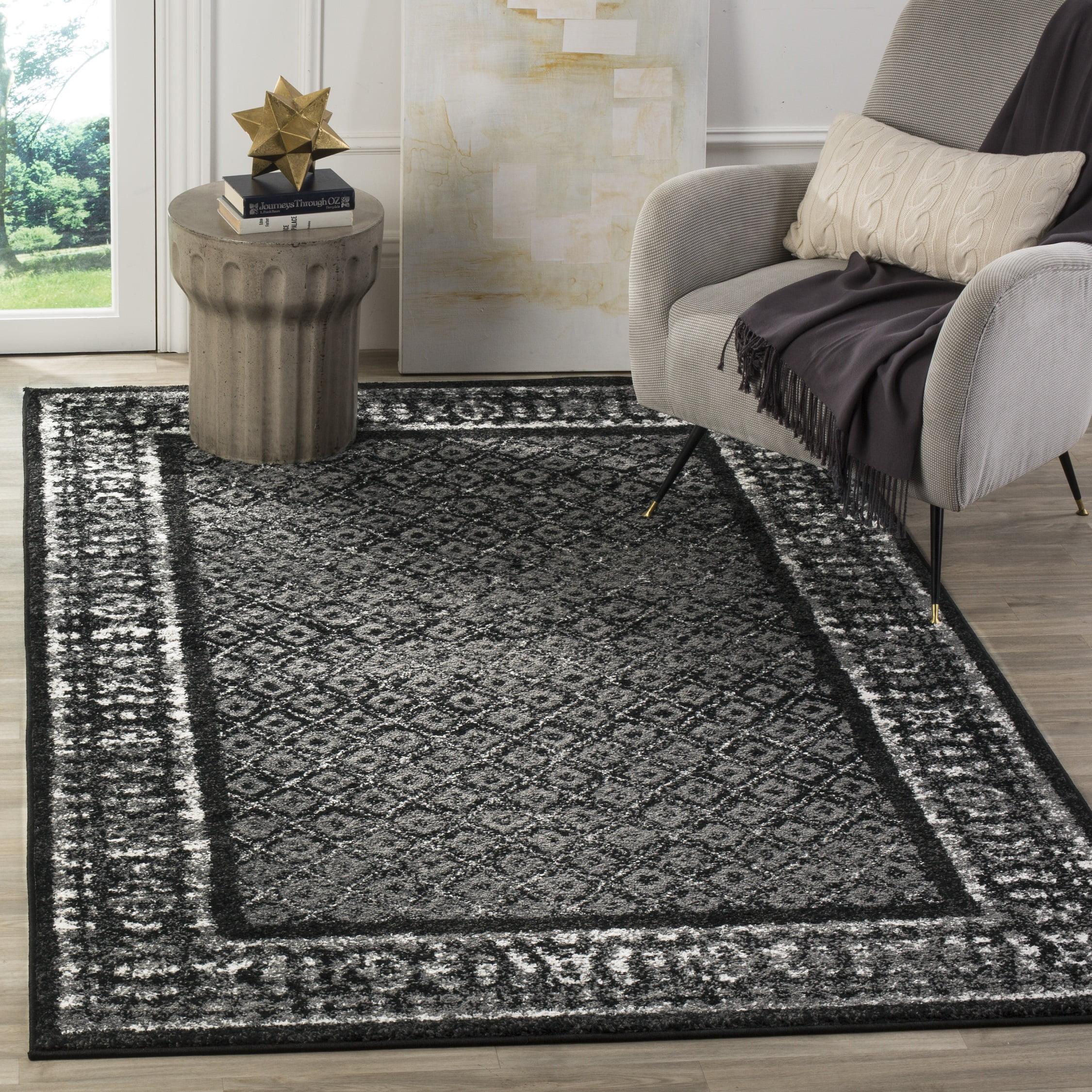 6' x 9' Black and Silver Synthetic Reversible Area Rug