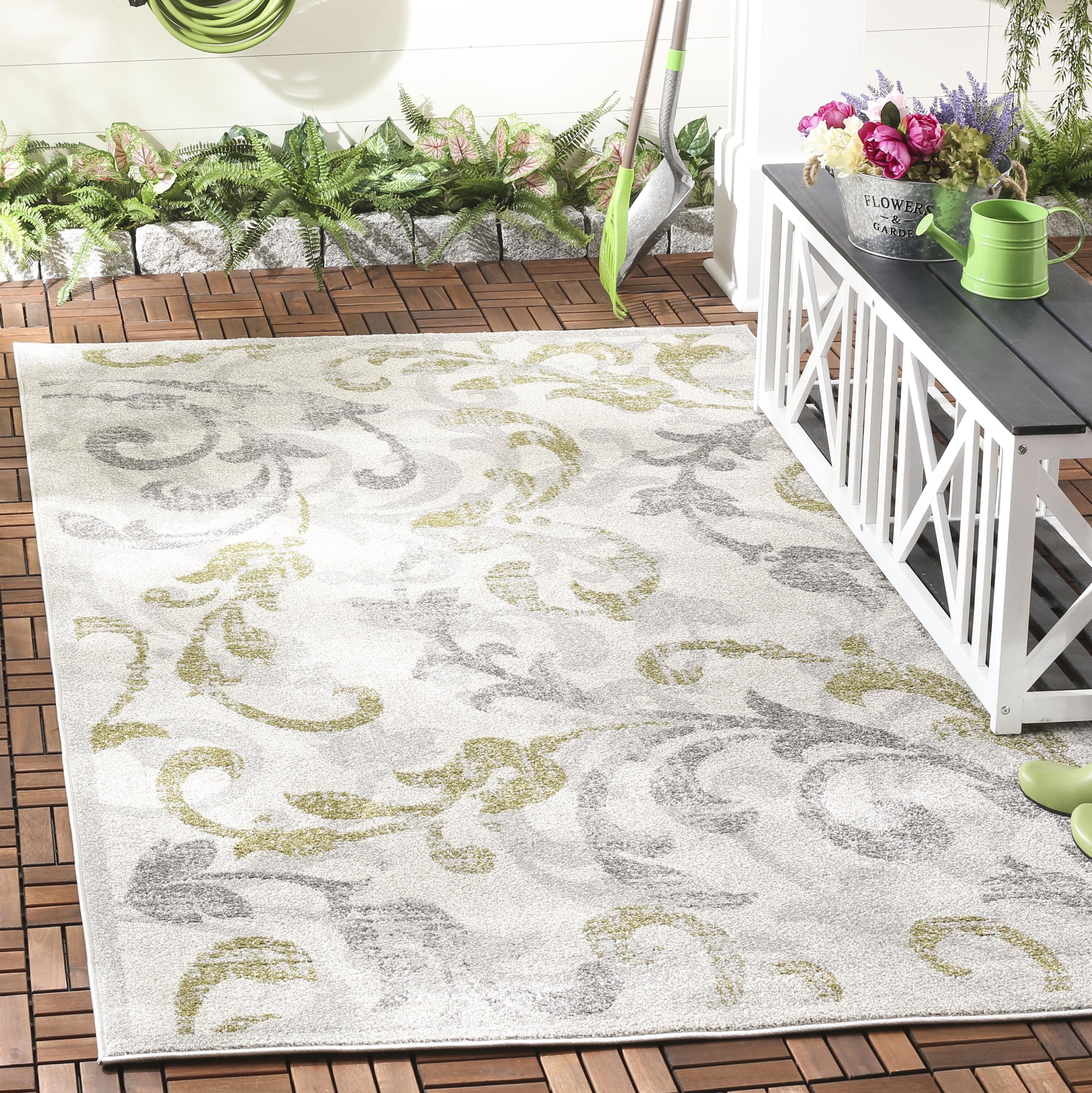 Ivory and Light Grey Floral Synthetic Area Rug