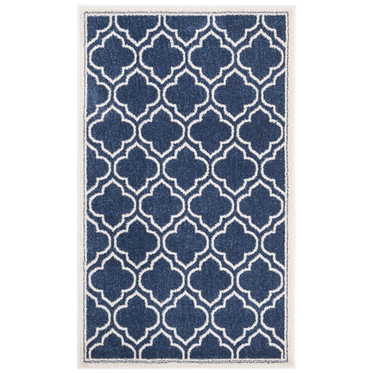 Navy and Ivory Geometric Pattern Low Pile Area Rug