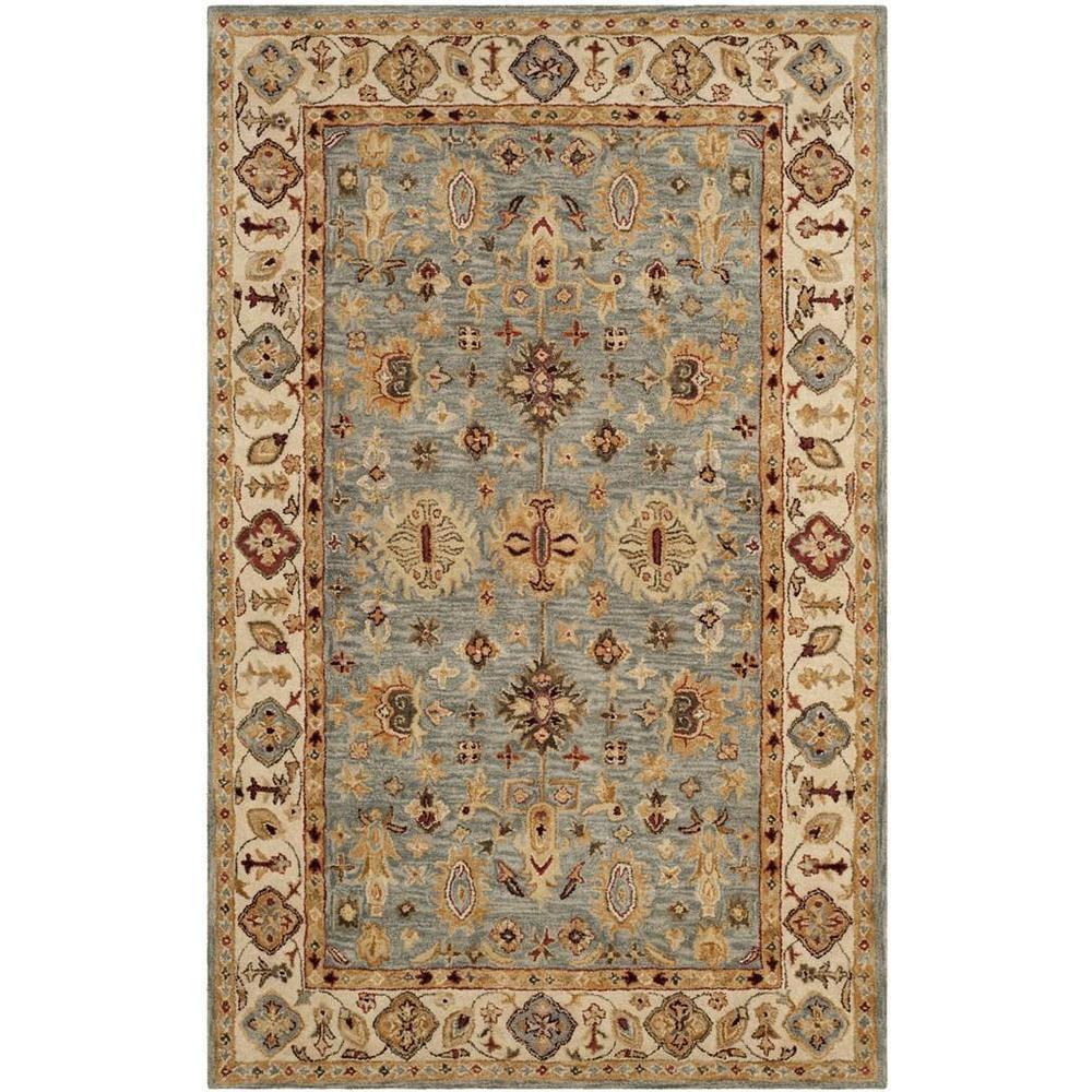 Antiquity AT847 Hand Tufted Area Rug - Blue/Ivory - 6'x9' - Safavieh.