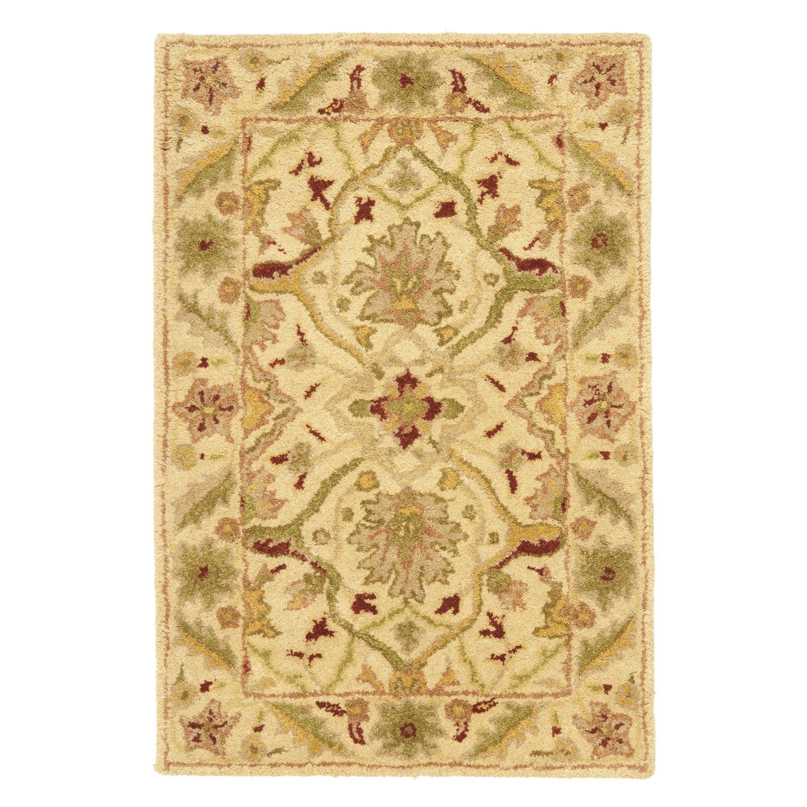 Ivory Tufted Handmade Wool 6' x 9' Rectangular Area Rug