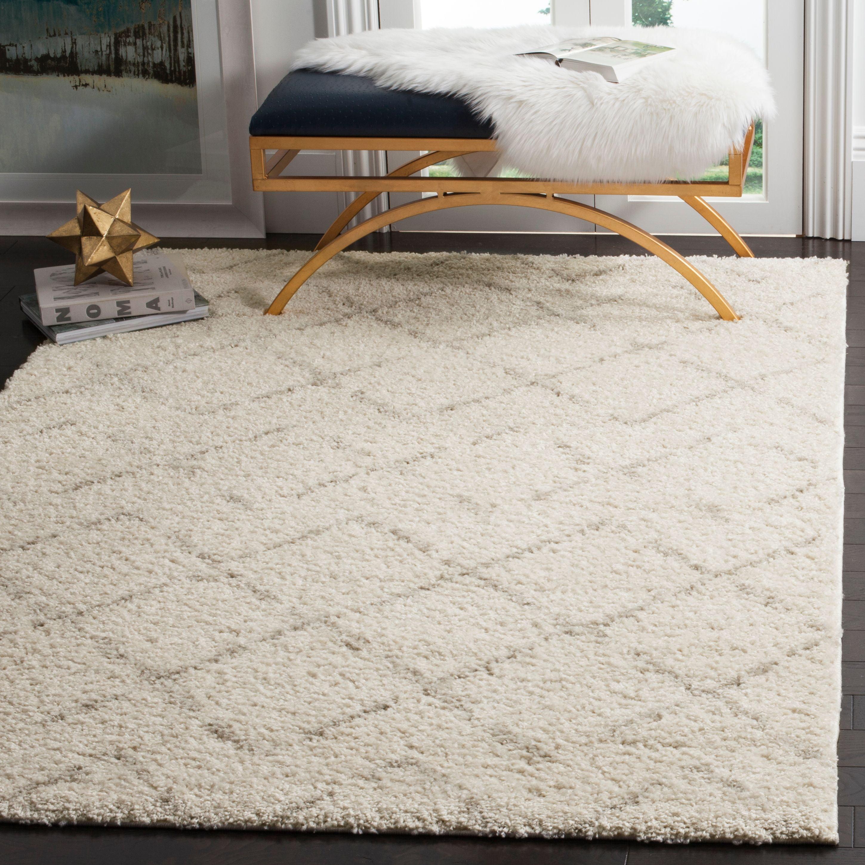 Ivory and Beige Geometric Shag 8' x 10' Area Rug