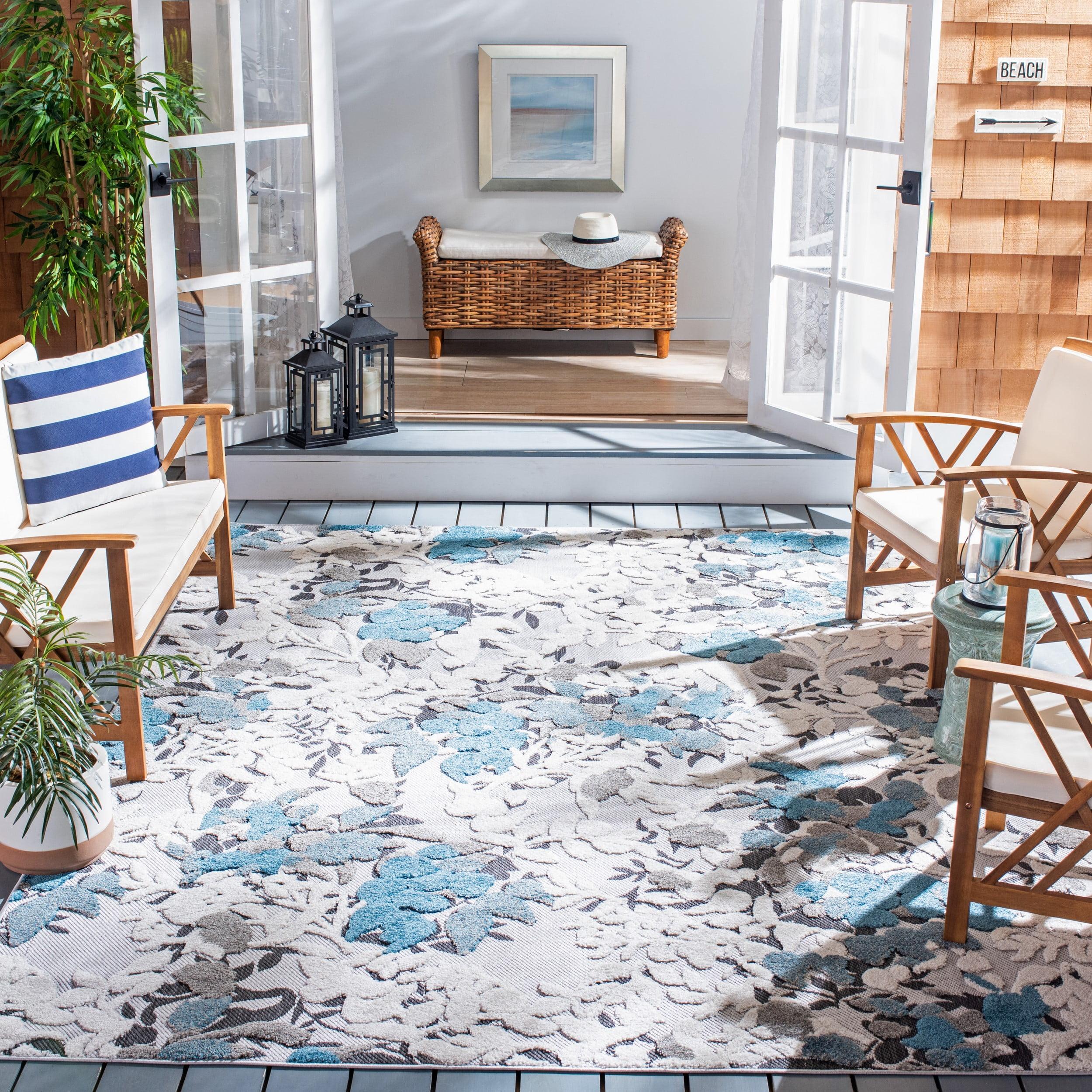 Beige and Blue Floral Synthetic 9' x 12' Area Rug