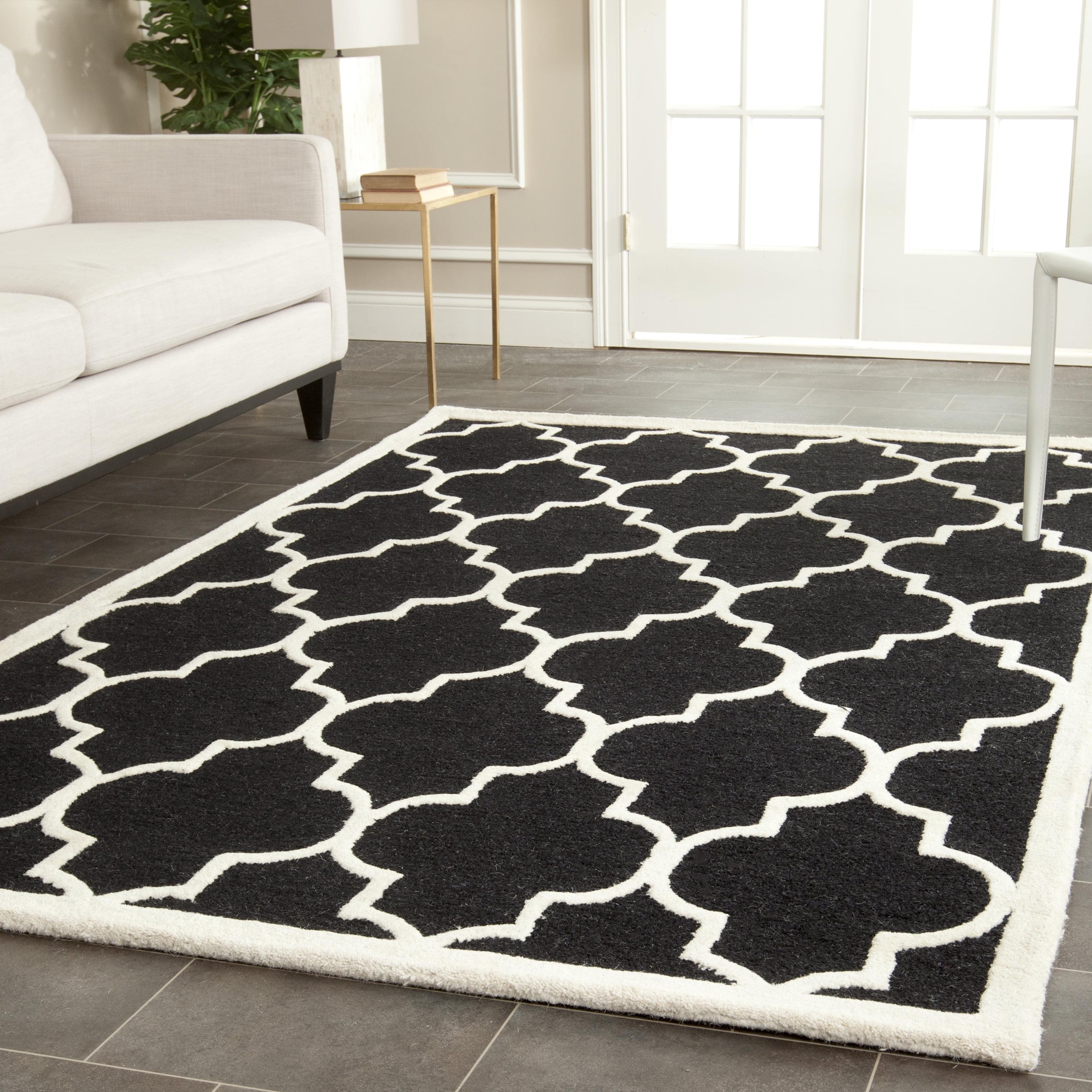 Handmade Black and Ivory Wool 6' x 9' Geometric Area Rug