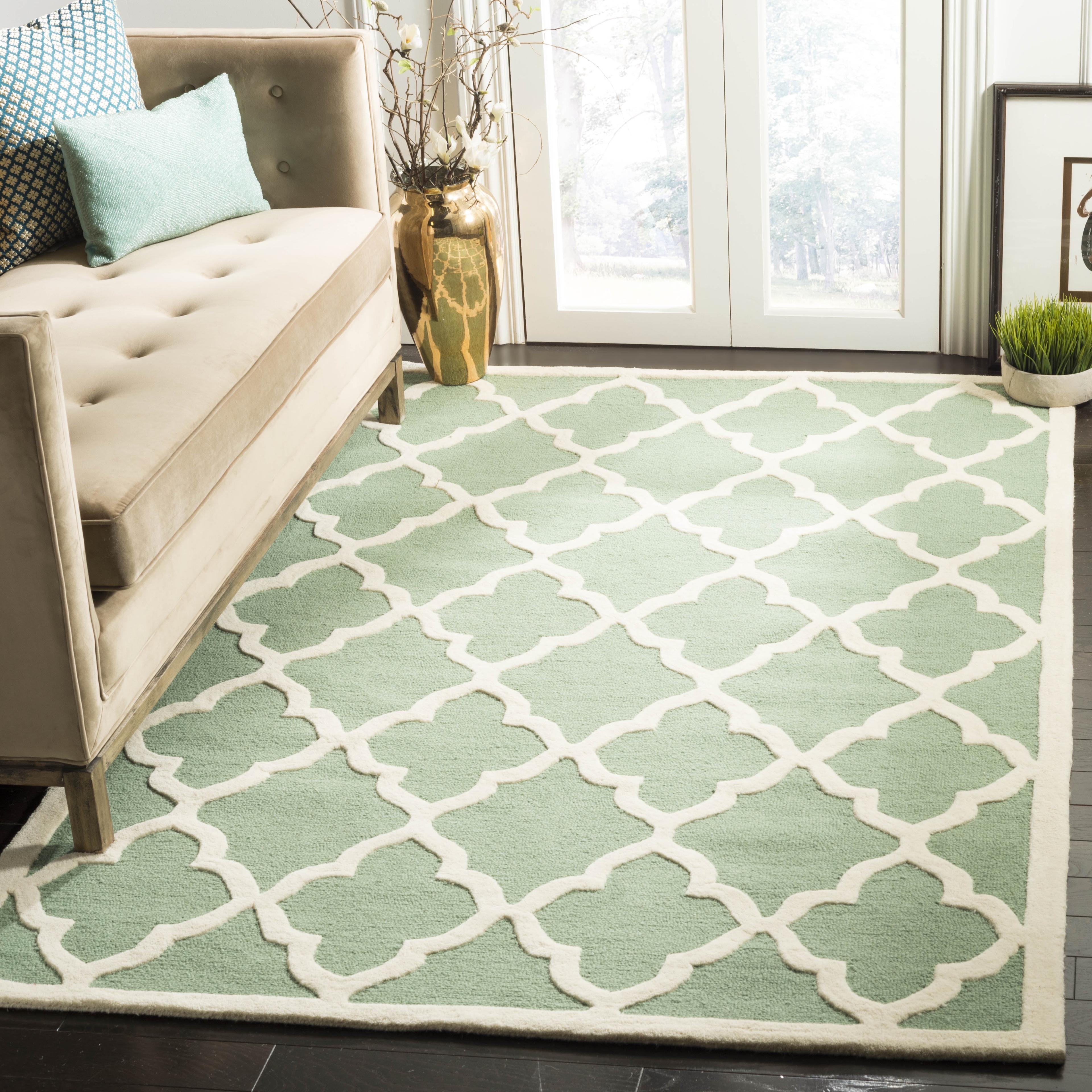 Teal and Ivory Hand-Tufted Wool 5' x 8' Area Rug