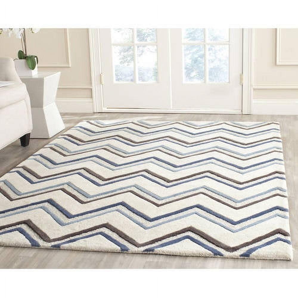 SAFAVIEH Cambridge Ravenna Zig Zag Stripes Wool Area Rug, Ivory/Blue, 5' x 8'