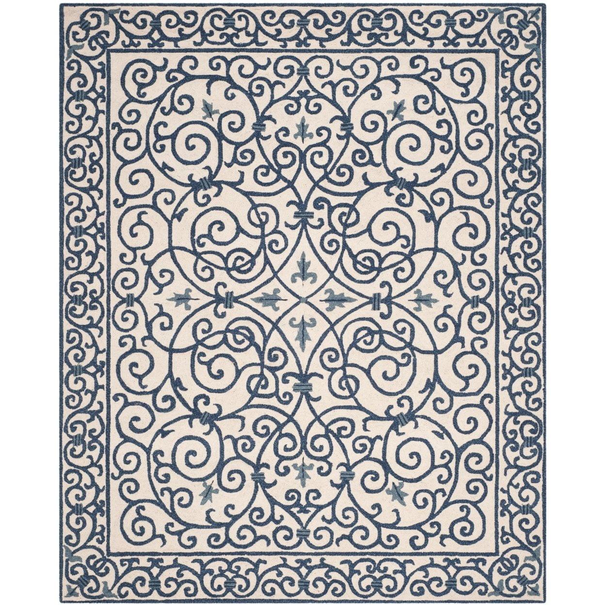 SAFAVIEH Chelsea Aragon Geometric Borders Wool Area Rug, Ivory/Dark Blue, 2'6" x 4'