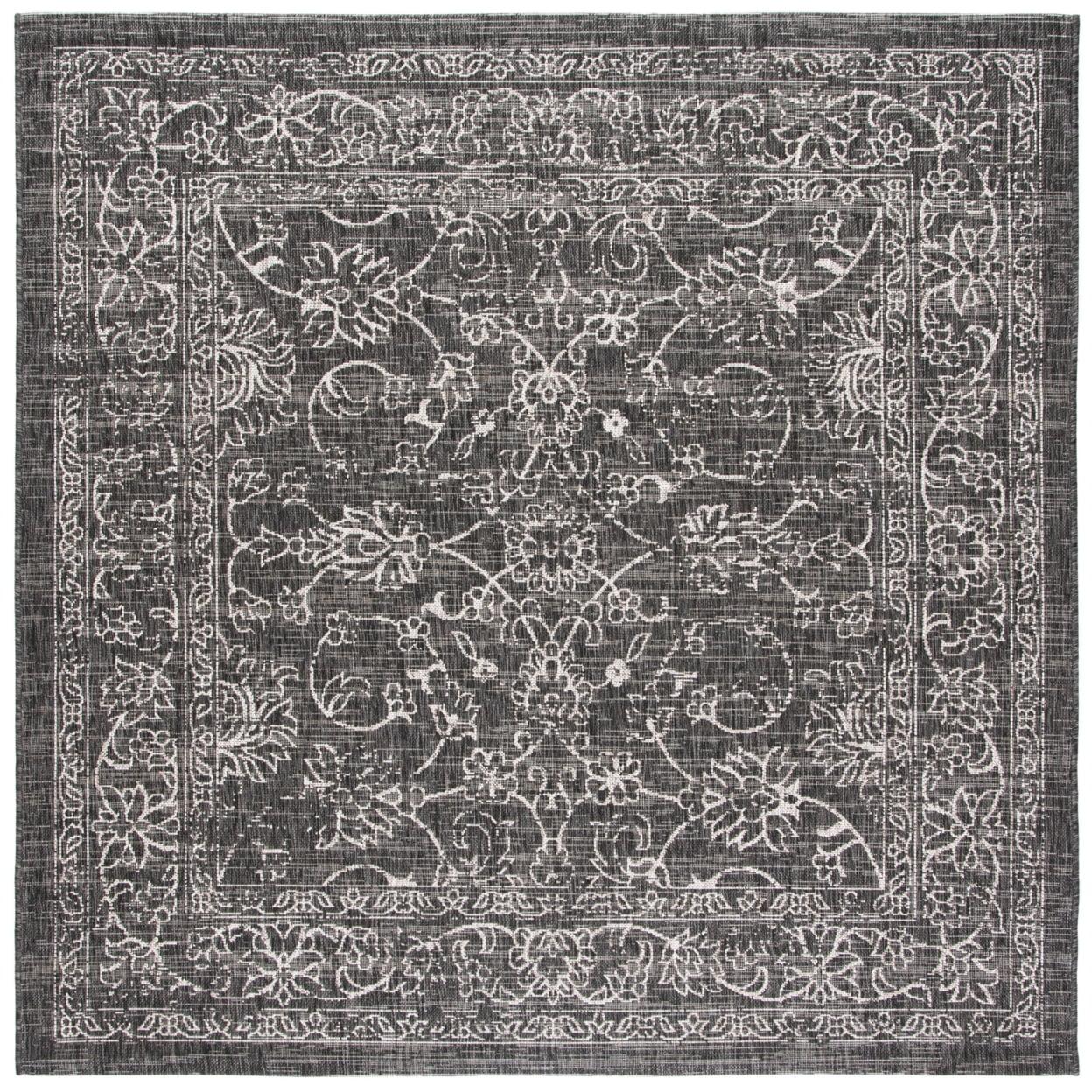 Courtyard Elegance 6'7" Square Black & Ivory Synthetic Area Rug