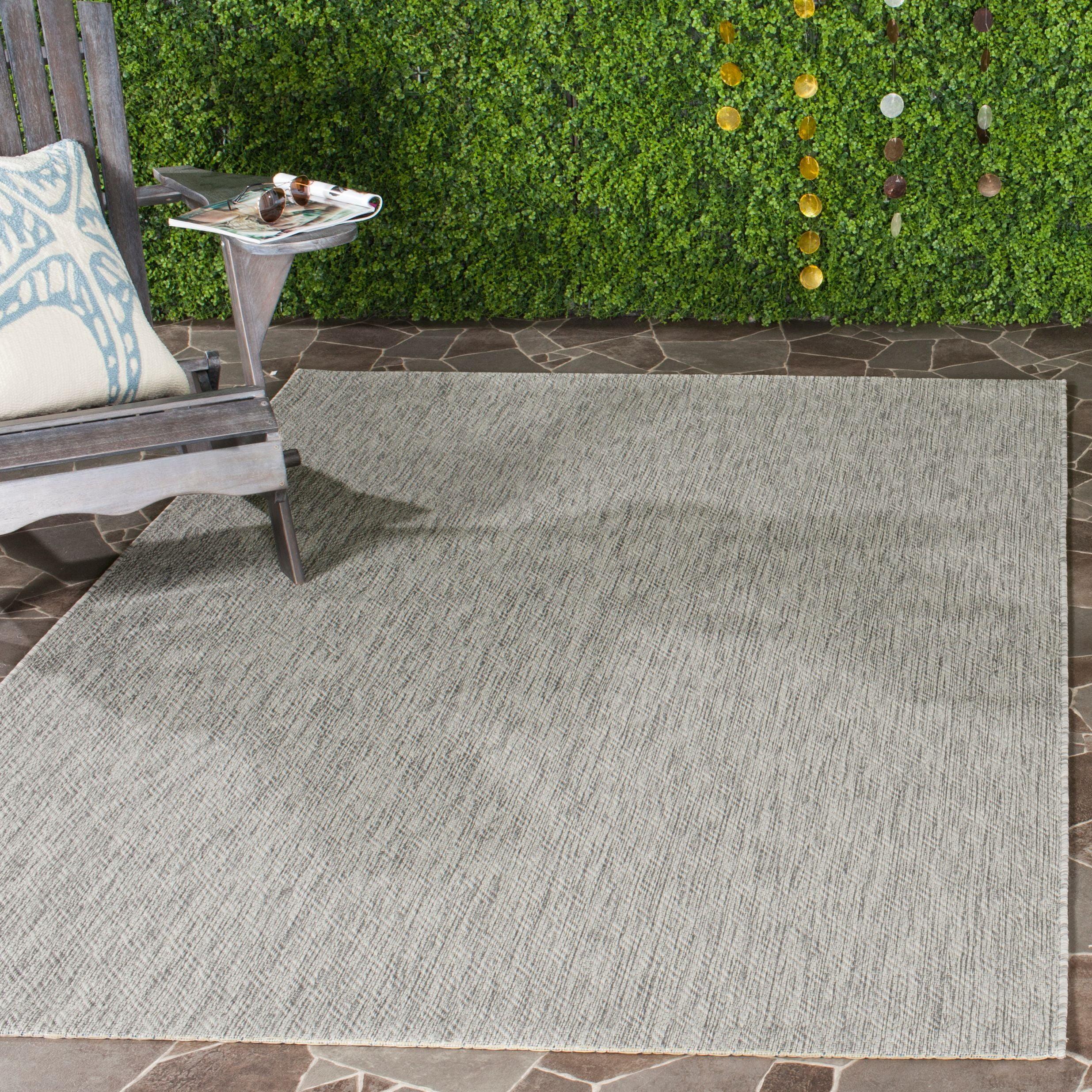 Delano Monochrome Gray Synthetic 6'7" x 9'6" Indoor/Outdoor Rug