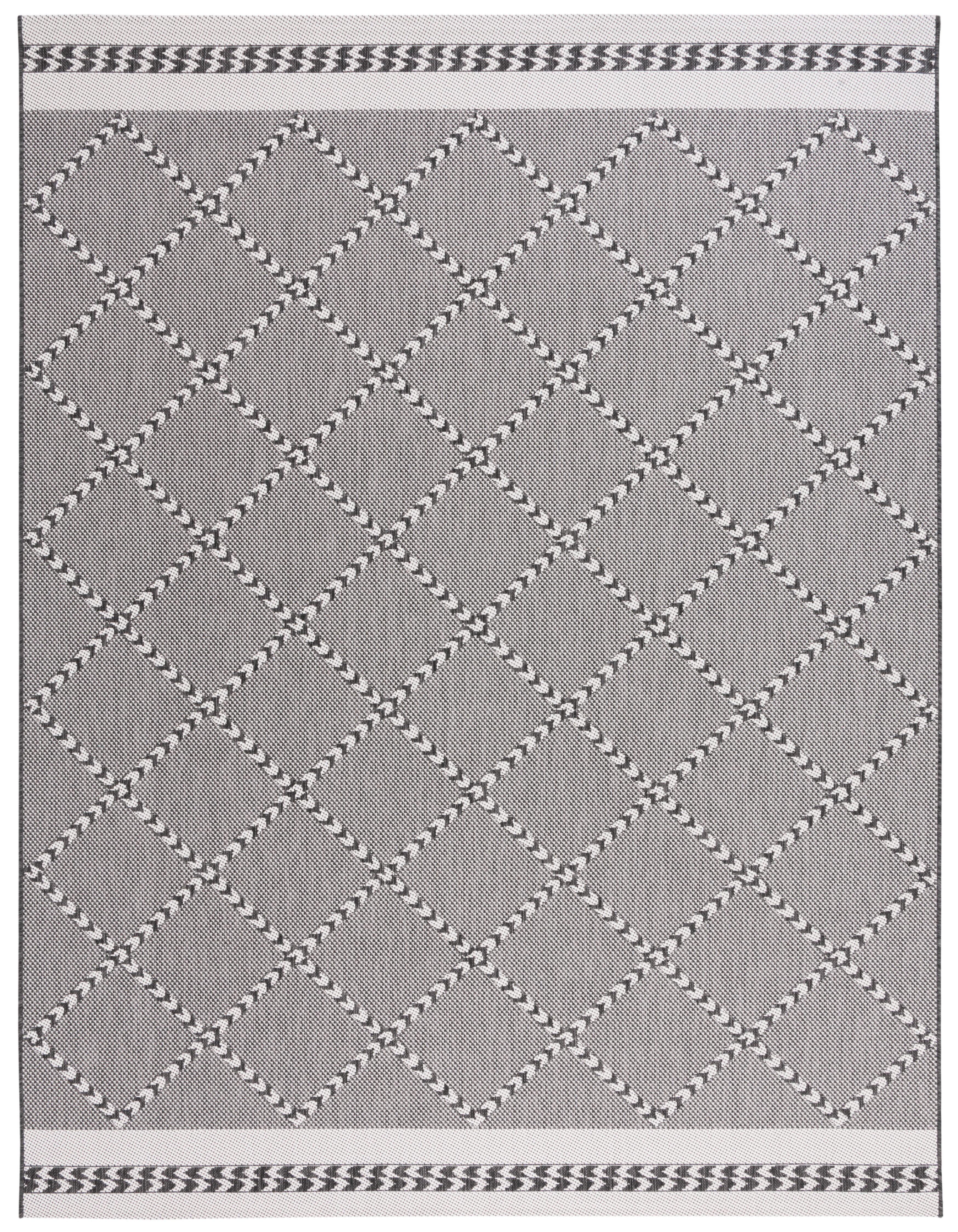 Percival Black and Ivory Geometric 8' x 10' Synthetic Area Rug