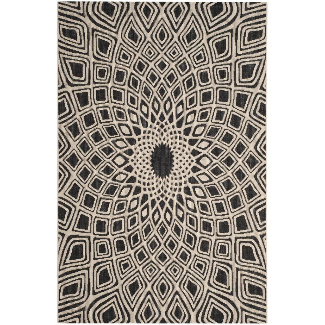 Geometric Black and Beige Synthetic Outdoor Area Rug