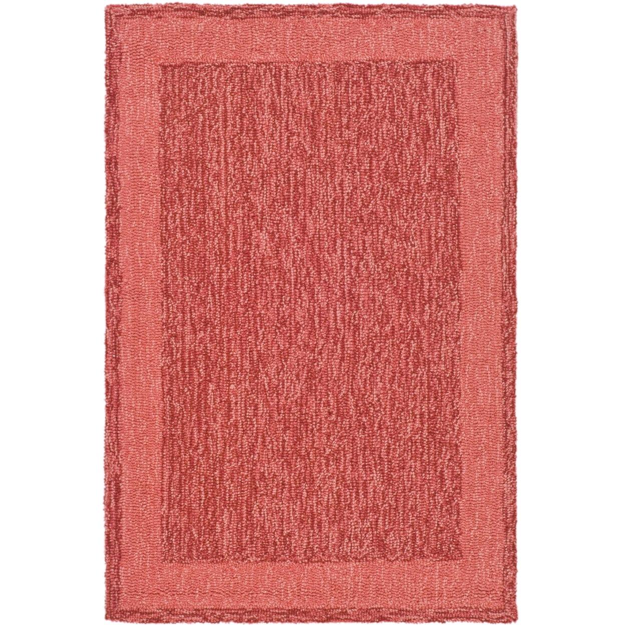 Taran Handmade Looped Red Area Rug