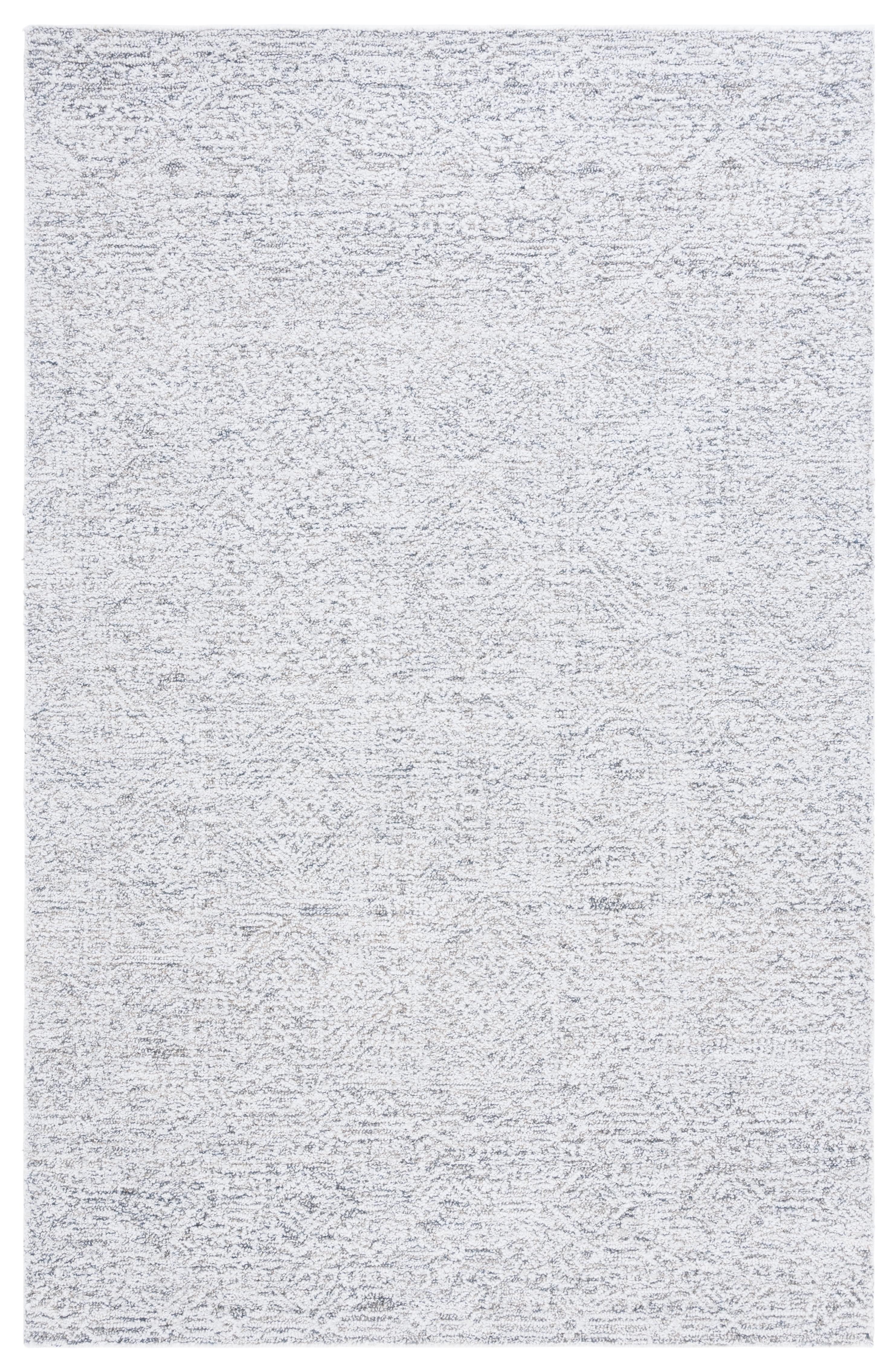 Ivory Hand Tufted Wool and Synthetic Area Rug