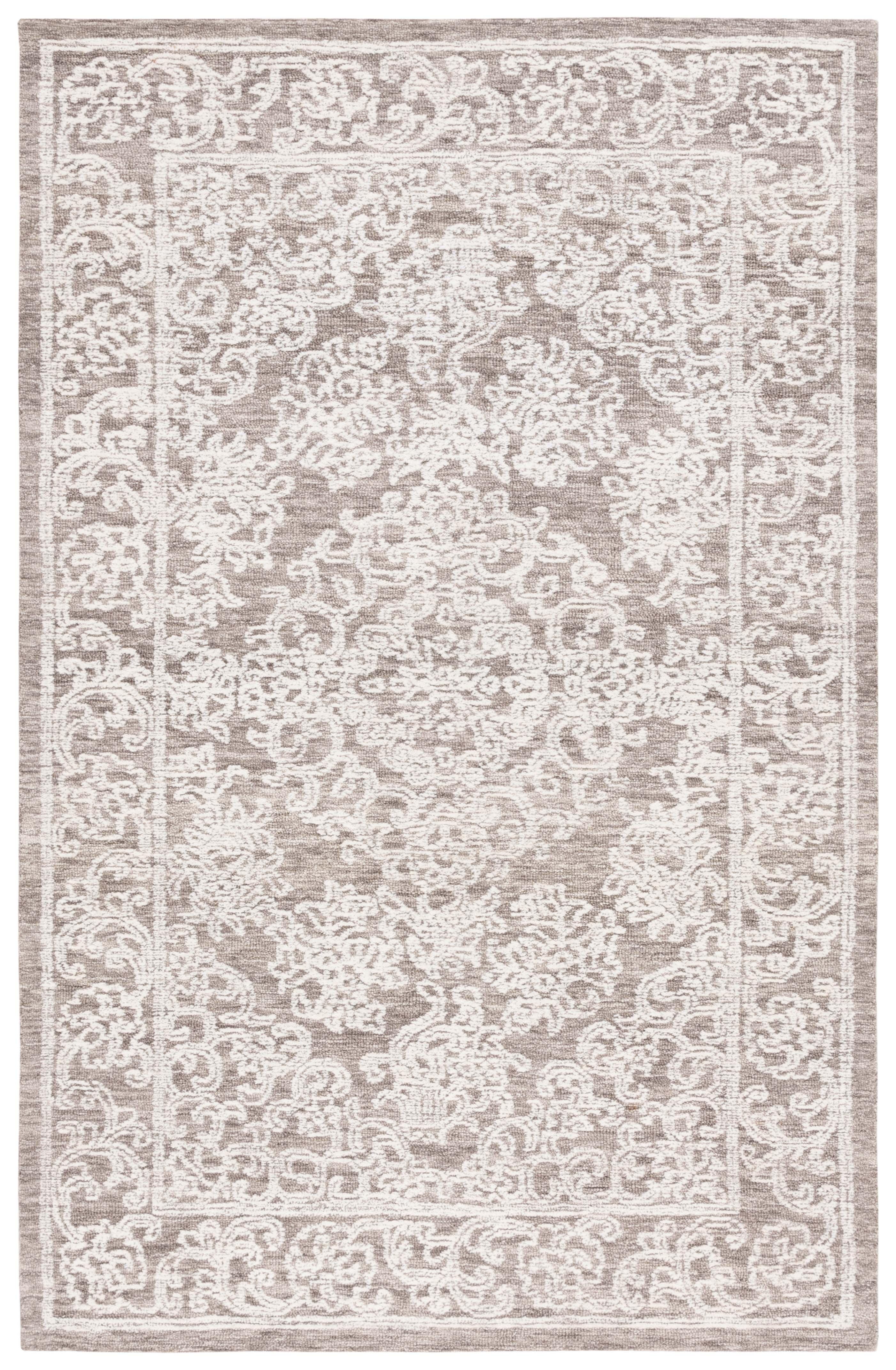 Ivory and Dark Grey 4' x 6' Hand Tufted Wool Area Rug