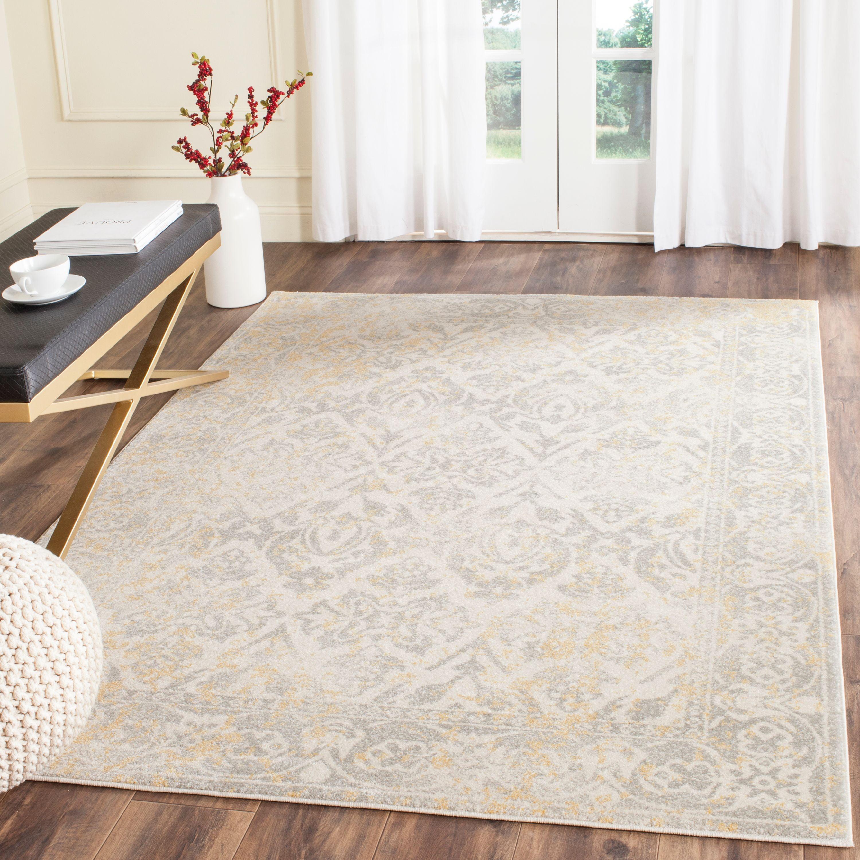 Ivory and Gray Synthetic Damask Area Rug with Border Embellishment