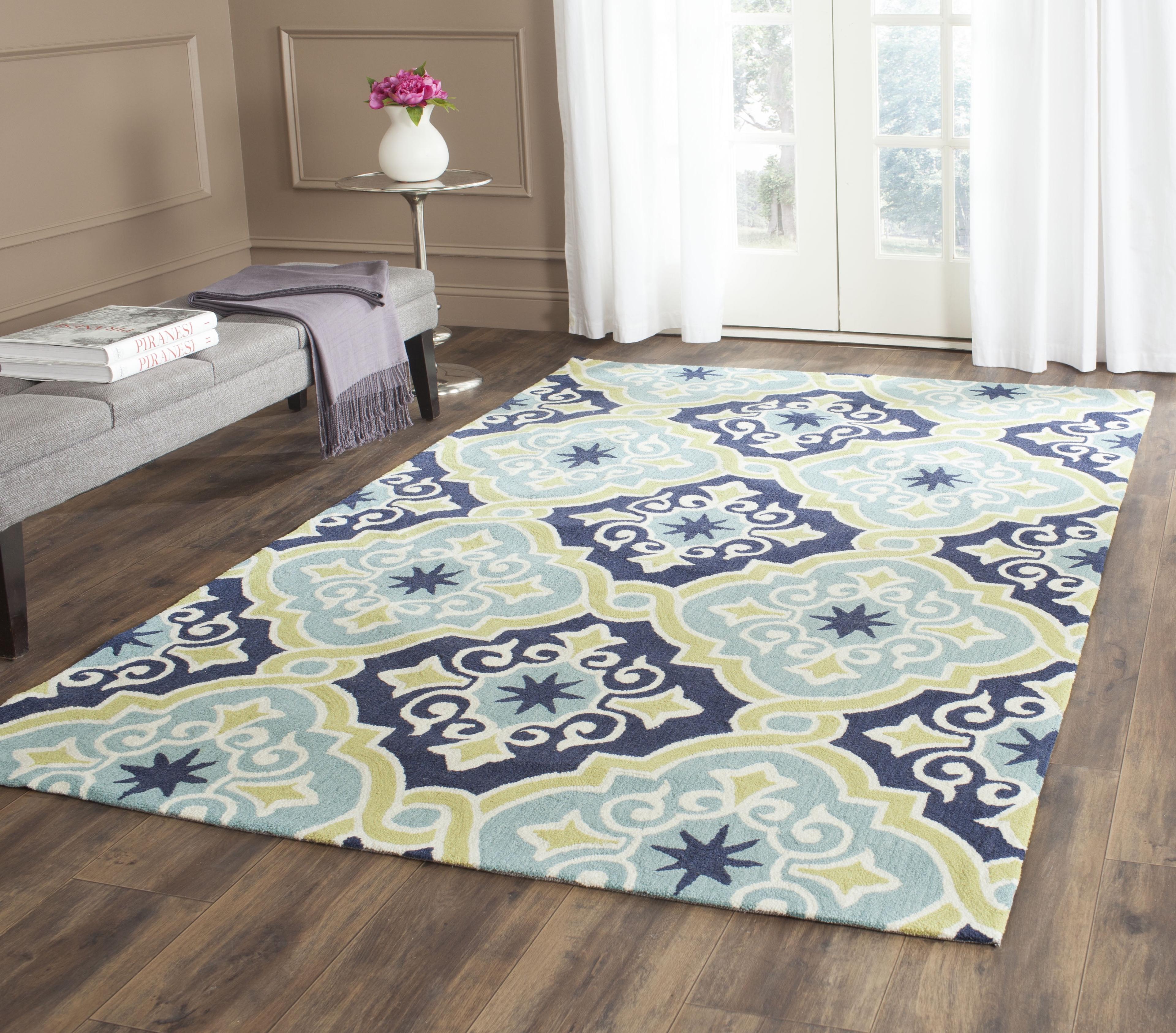 Handmade Blue Floral Wool and Synthetic Area Rug