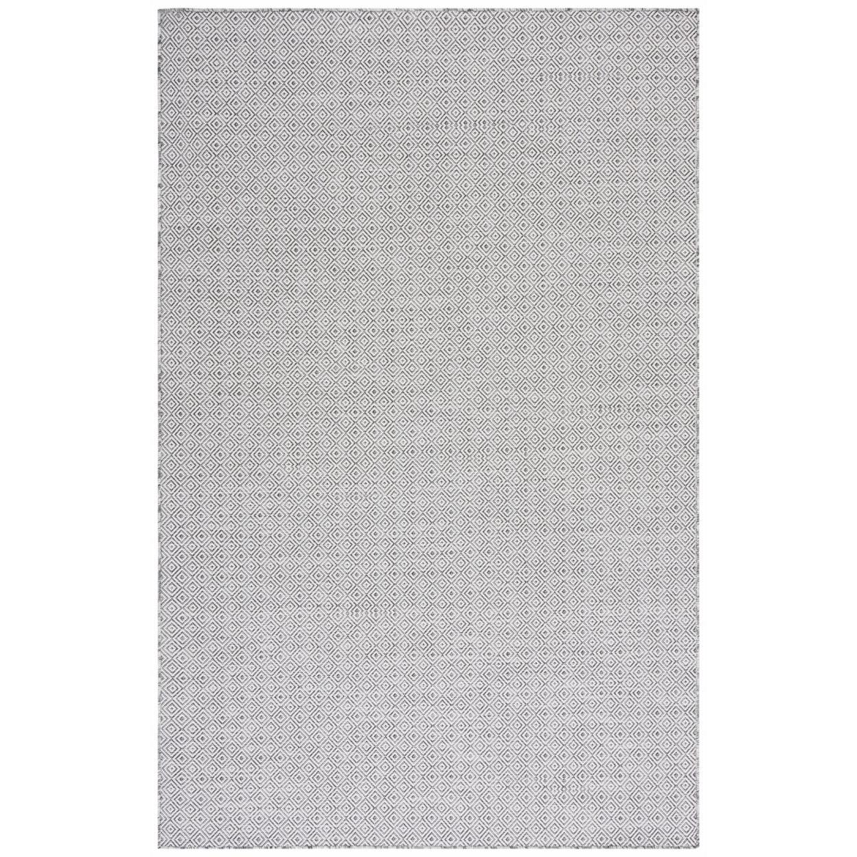 Hampton HTN230 Indoor/Outdoor Machine Made Area Rug - 5'1"x7'6" - Ivory/Black - Safavieh
