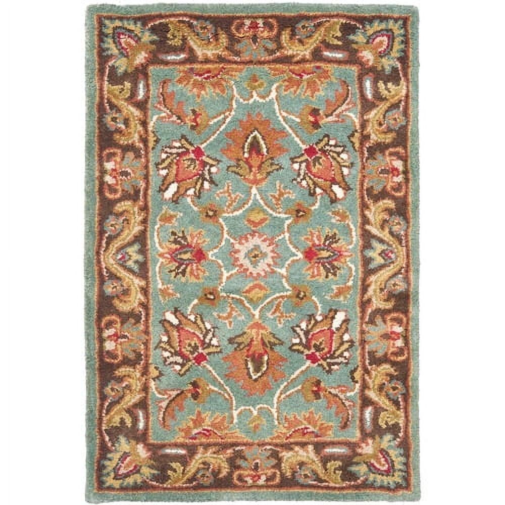Heritage HG812 Hand Tufted Area Rug - Blue/Brown - 4'6"x6'6" Oval - Safavieh.