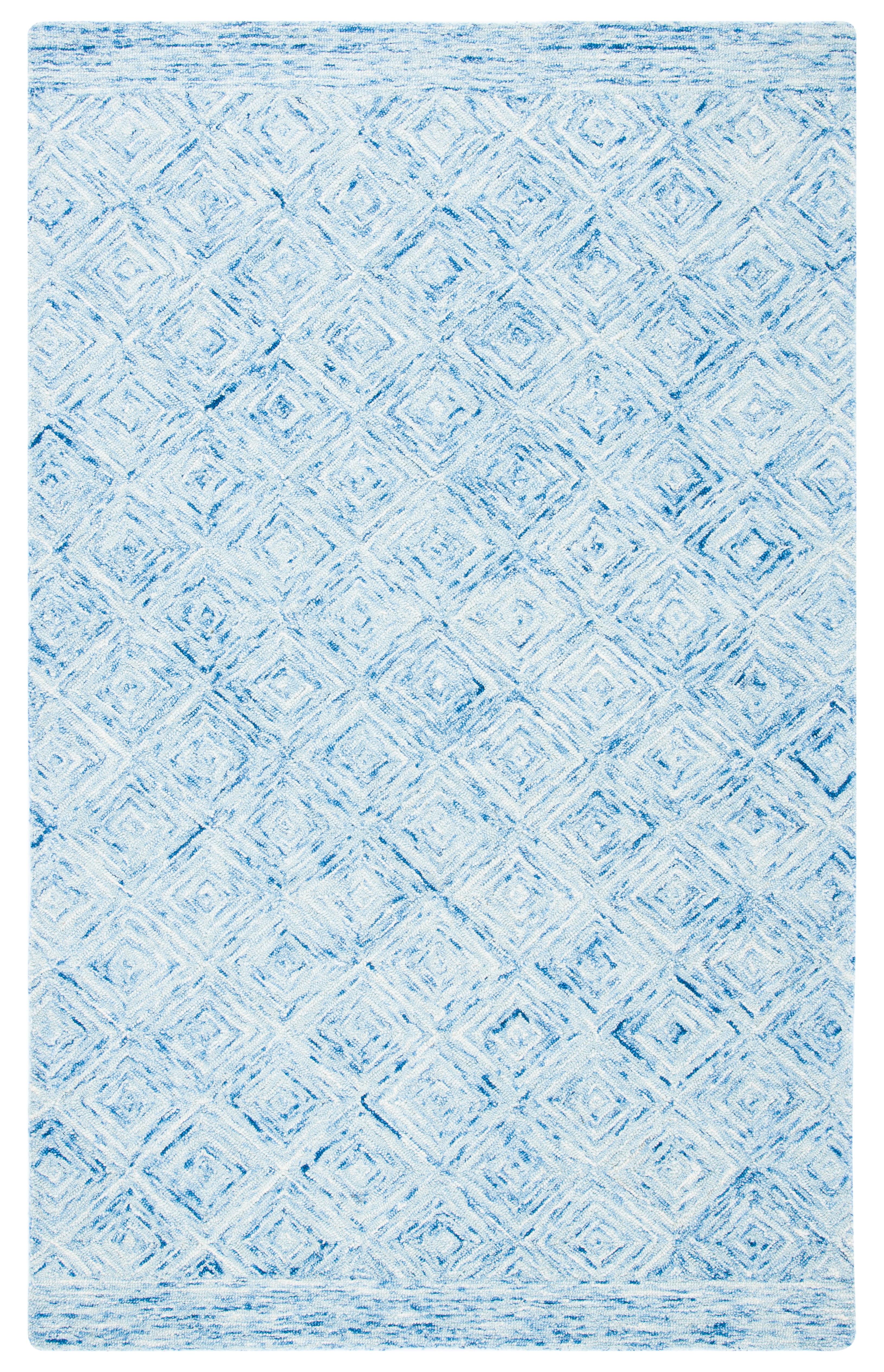 Ikat IKT704 Hand Tufted Area Rug - Blue - 6'x9' - Safavieh.
