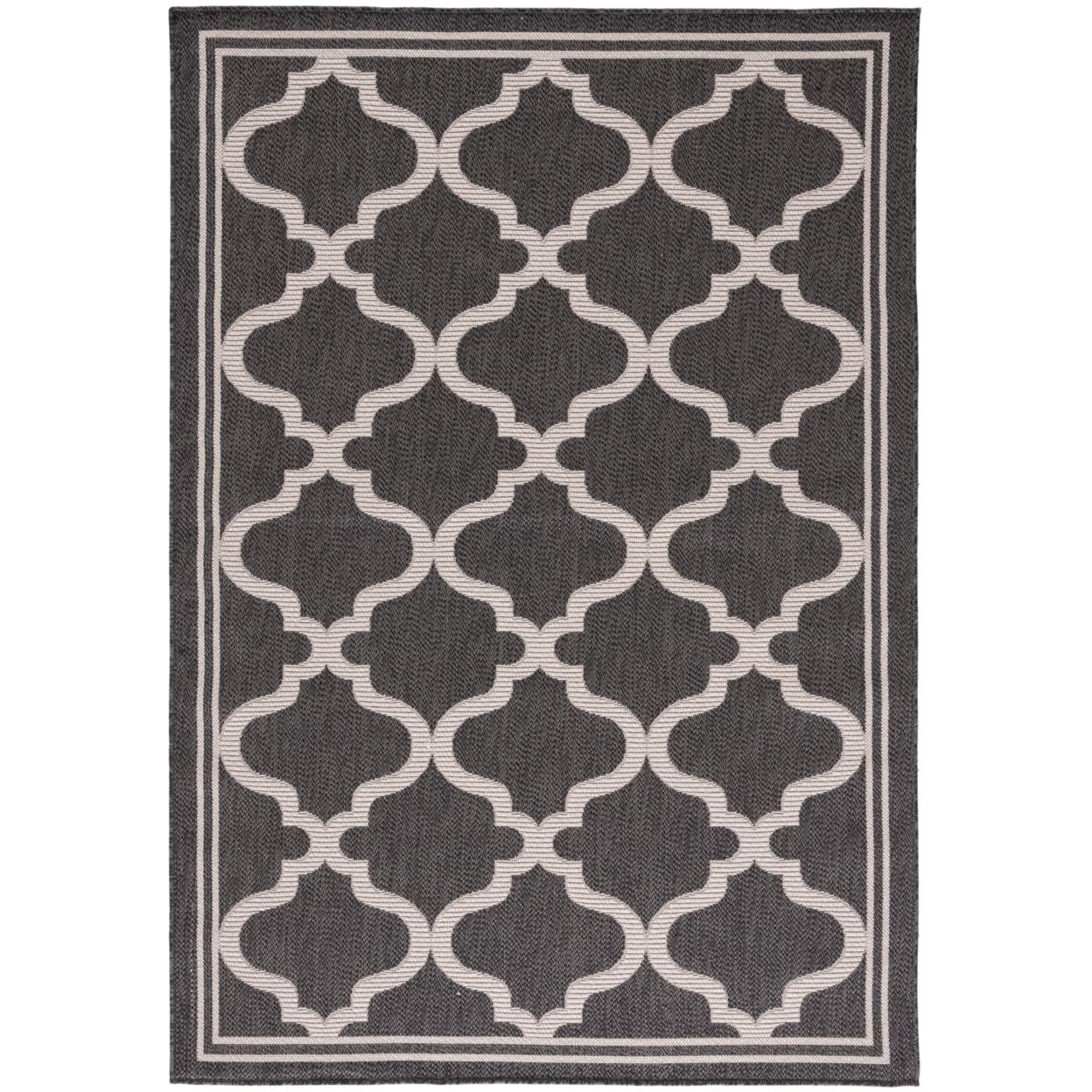 Charcoal and Ivory Geometric Synthetic 5'3" x 7'6" Area Rug