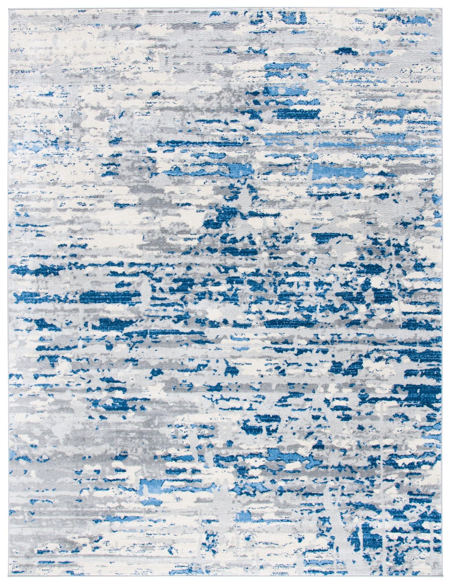 Ivory/Blue Abstract Synthetic 8' x 10' Easy Care Area Rug