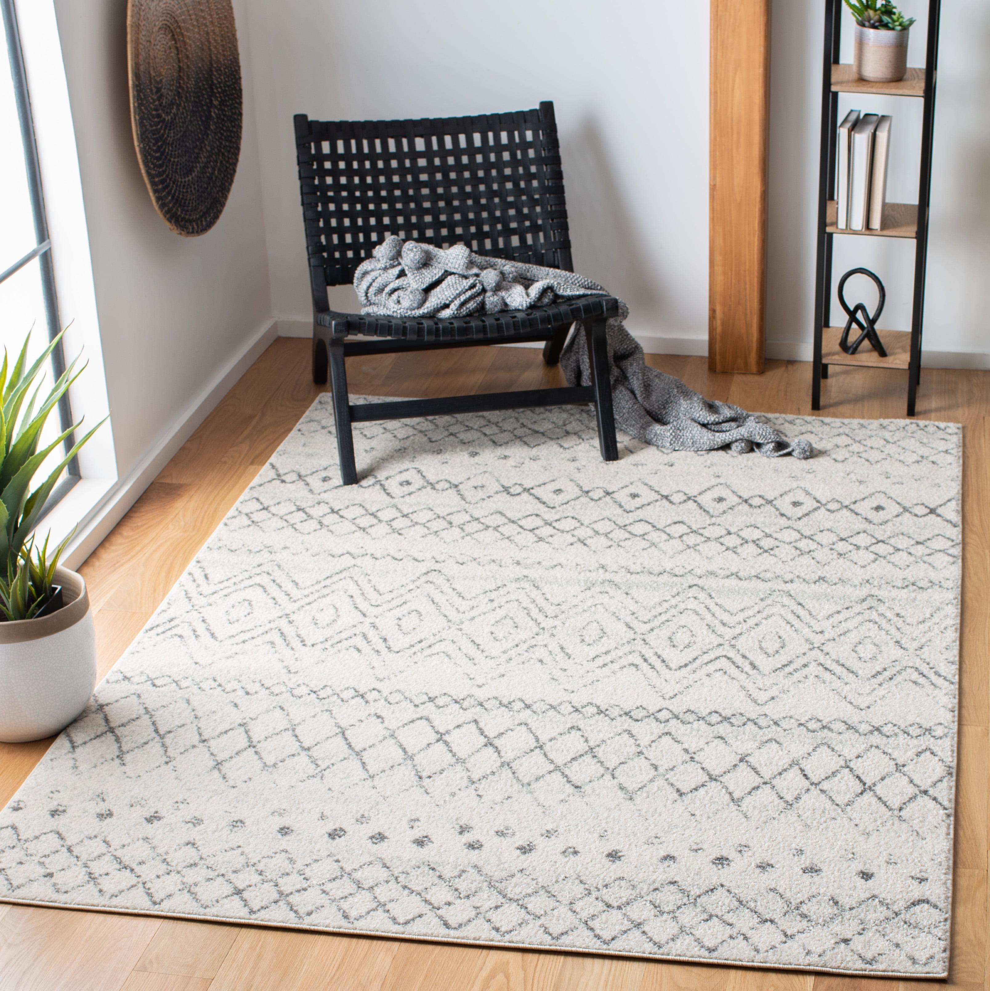 Ivory and Charcoal Geometric Synthetic Area Rug