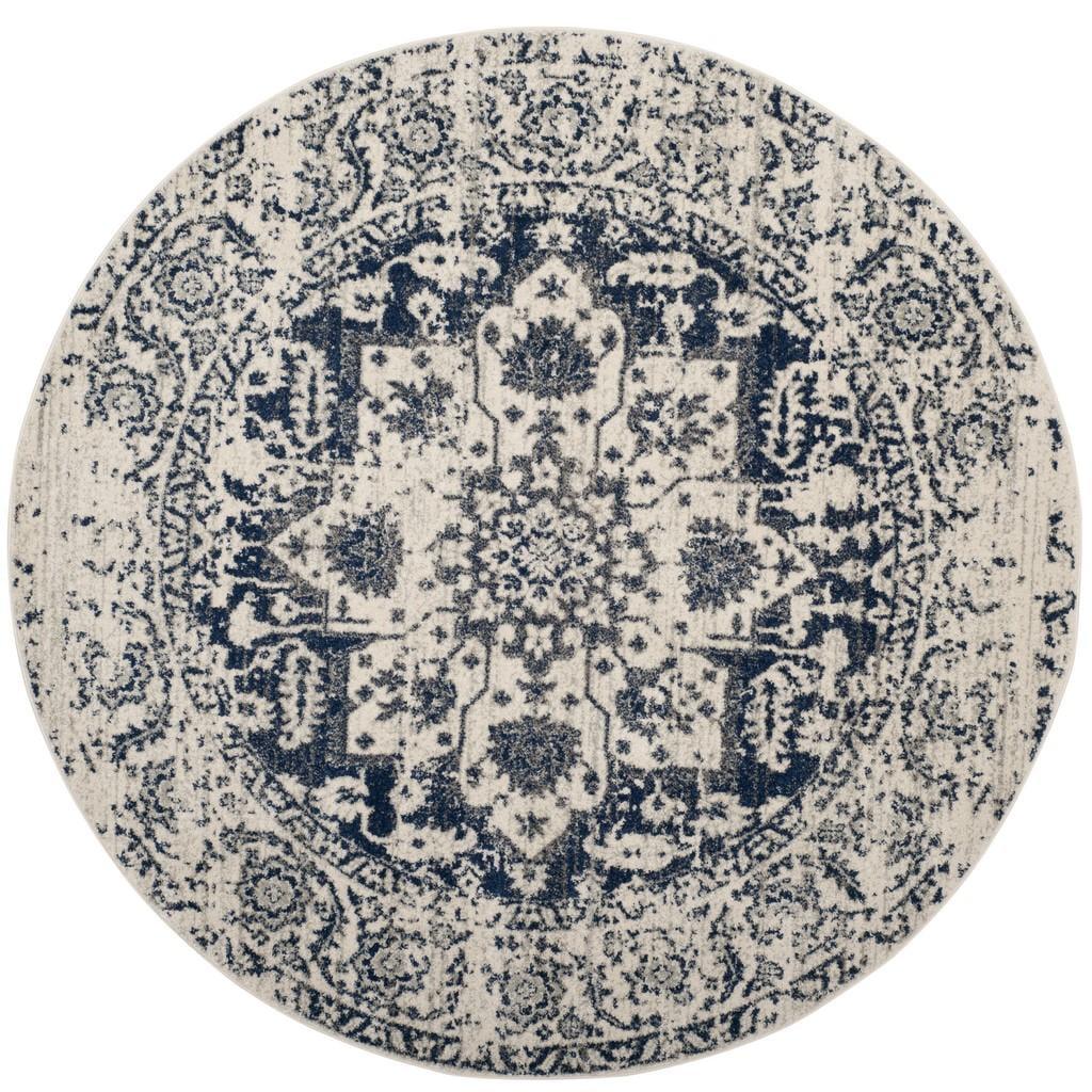 Ivory and Navy Synthetic 3' Round Reversible Area Rug